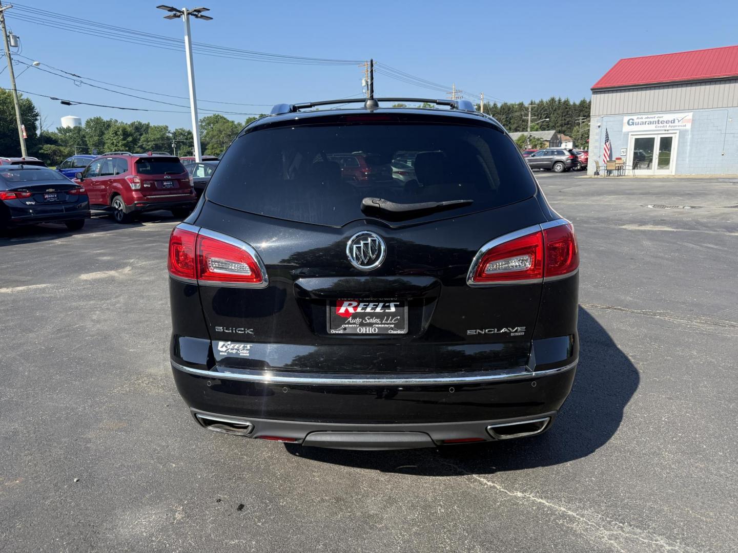 2017 Black /Black Buick Enclave Leather AWD (5GAKVBKD8HJ) with an 3.6L V6 DOHC 24V engine, 6A transmission, located at 547 E. Main St., Orwell, OH, 44076, (440) 437-5893, 41.535435, -80.847855 - This 2017 Buick Enclave Leather AWD is a well-equipped midsize SUV featuring a 3.6L V6 engine and 6-speed automatic transmission. It offers comfort and convenience with leather interior, power and heated front seats, tri-zone automatic climate control, and 2nd-row captain’s chairs. Technology high - Photo#8