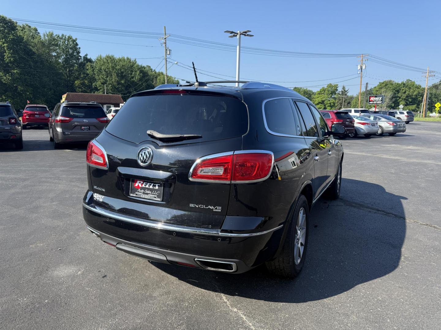 2017 Black /Black Buick Enclave Leather AWD (5GAKVBKD8HJ) with an 3.6L V6 DOHC 24V engine, 6A transmission, located at 547 E. Main St., Orwell, OH, 44076, (440) 437-5893, 41.535435, -80.847855 - This 2017 Buick Enclave Leather AWD is a well-equipped midsize SUV featuring a 3.6L V6 engine and 6-speed automatic transmission. It offers comfort and convenience with leather interior, power and heated front seats, tri-zone automatic climate control, and 2nd-row captain’s chairs. Technology high - Photo#7
