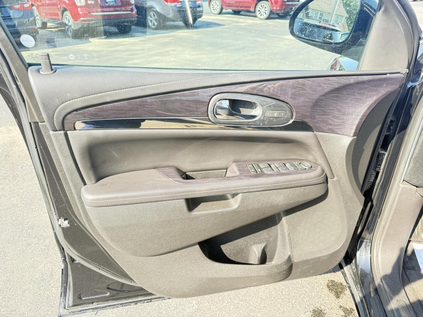 2017 Black /Black Buick Enclave Leather AWD (5GAKVBKD8HJ) with an 3.6L V6 DOHC 24V engine, 6A transmission, located at 547 E. Main St., Orwell, OH, 44076, (440) 437-5893, 41.535435, -80.847855 - This 2017 Buick Enclave Leather AWD is a well-equipped midsize SUV featuring a 3.6L V6 engine and 6-speed automatic transmission. It offers comfort and convenience with leather interior, power and heated front seats, tri-zone automatic climate control, and 2nd-row captain’s chairs. Technology high - Photo#16