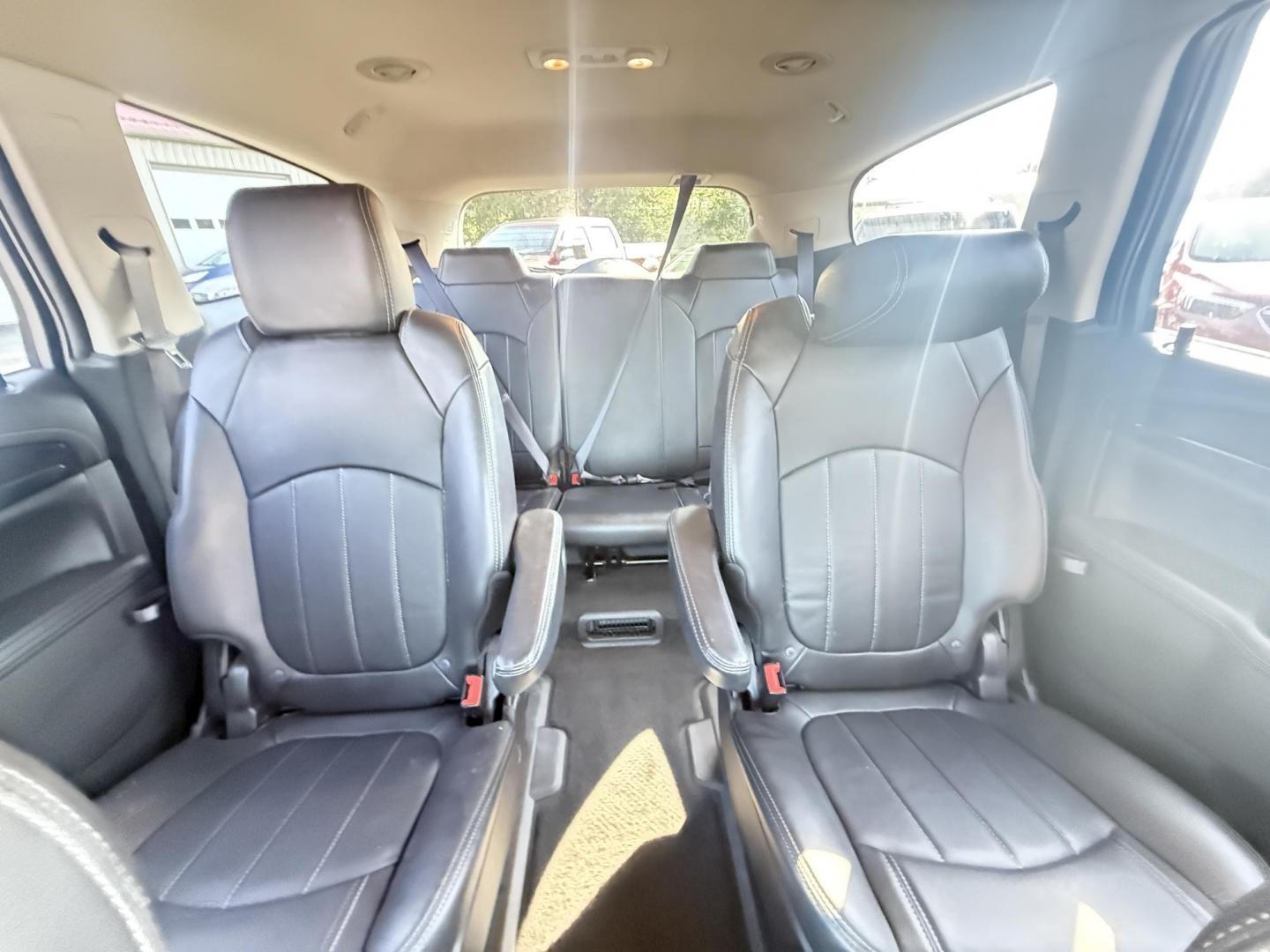 2017 Black /Black Buick Enclave Leather AWD (5GAKVBKD8HJ) with an 3.6L V6 DOHC 24V engine, 6A transmission, located at 547 E. Main St., Orwell, OH, 44076, (440) 437-5893, 41.535435, -80.847855 - This 2017 Buick Enclave Leather AWD is a well-equipped midsize SUV featuring a 3.6L V6 engine and 6-speed automatic transmission. It offers comfort and convenience with leather interior, power and heated front seats, tri-zone automatic climate control, and 2nd-row captain’s chairs. Technology high - Photo#29