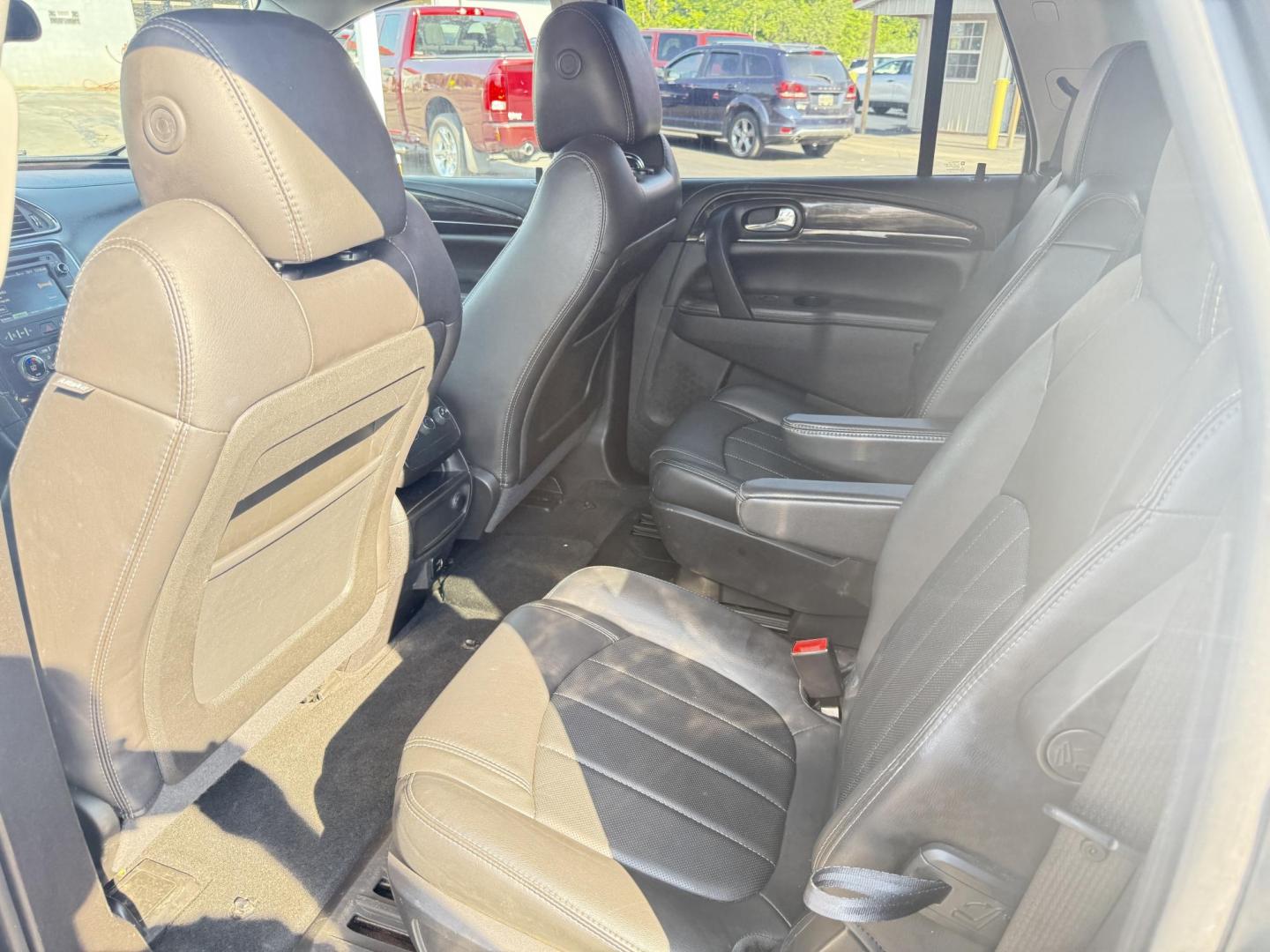 2017 Black /Black Buick Enclave Leather AWD (5GAKVBKD8HJ) with an 3.6L V6 DOHC 24V engine, 6A transmission, located at 547 E. Main St., Orwell, OH, 44076, (440) 437-5893, 41.535435, -80.847855 - This 2017 Buick Enclave Leather AWD is a well-equipped midsize SUV featuring a 3.6L V6 engine and 6-speed automatic transmission. It offers comfort and convenience with leather interior, power and heated front seats, tri-zone automatic climate control, and 2nd-row captain’s chairs. Technology high - Photo#30