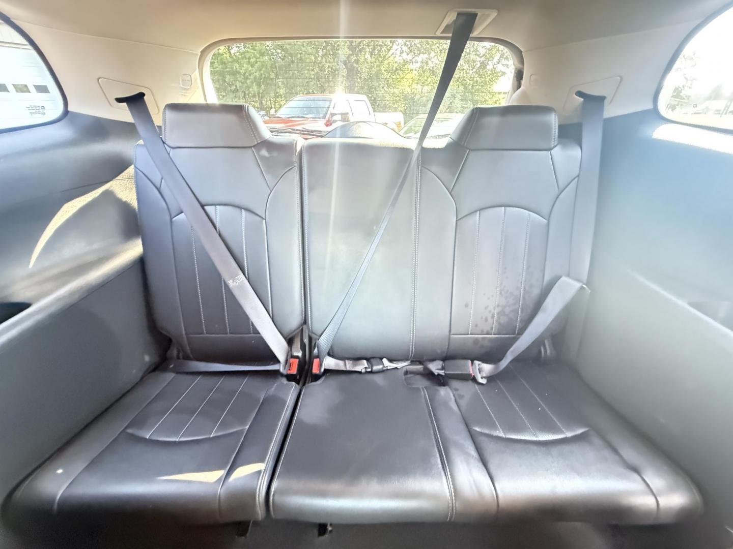 2017 Black /Black Buick Enclave Leather AWD (5GAKVBKD8HJ) with an 3.6L V6 DOHC 24V engine, 6A transmission, located at 547 E. Main St., Orwell, OH, 44076, (440) 437-5893, 41.535435, -80.847855 - This 2017 Buick Enclave Leather AWD is a well-equipped midsize SUV featuring a 3.6L V6 engine and 6-speed automatic transmission. It offers comfort and convenience with leather interior, power and heated front seats, tri-zone automatic climate control, and 2nd-row captain’s chairs. Technology high - Photo#31