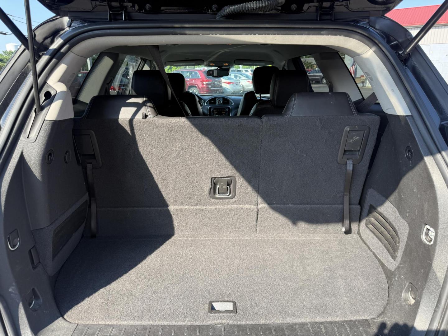 2017 Black /Black Buick Enclave Leather AWD (5GAKVBKD8HJ) with an 3.6L V6 DOHC 24V engine, 6A transmission, located at 547 E. Main St., Orwell, OH, 44076, (440) 437-5893, 41.535435, -80.847855 - This 2017 Buick Enclave Leather AWD is a well-equipped midsize SUV featuring a 3.6L V6 engine and 6-speed automatic transmission. It offers comfort and convenience with leather interior, power and heated front seats, tri-zone automatic climate control, and 2nd-row captain’s chairs. Technology high - Photo#36