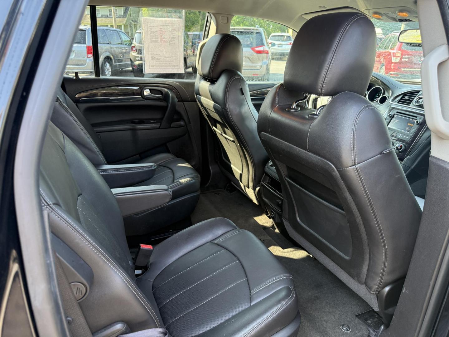 2017 Black /Black Buick Enclave Leather AWD (5GAKVBKD8HJ) with an 3.6L V6 DOHC 24V engine, 6A transmission, located at 547 E. Main St., Orwell, OH, 44076, (440) 437-5893, 41.535435, -80.847855 - This 2017 Buick Enclave Leather AWD is a well-equipped midsize SUV featuring a 3.6L V6 engine and 6-speed automatic transmission. It offers comfort and convenience with leather interior, power and heated front seats, tri-zone automatic climate control, and 2nd-row captain’s chairs. Technology high - Photo#38