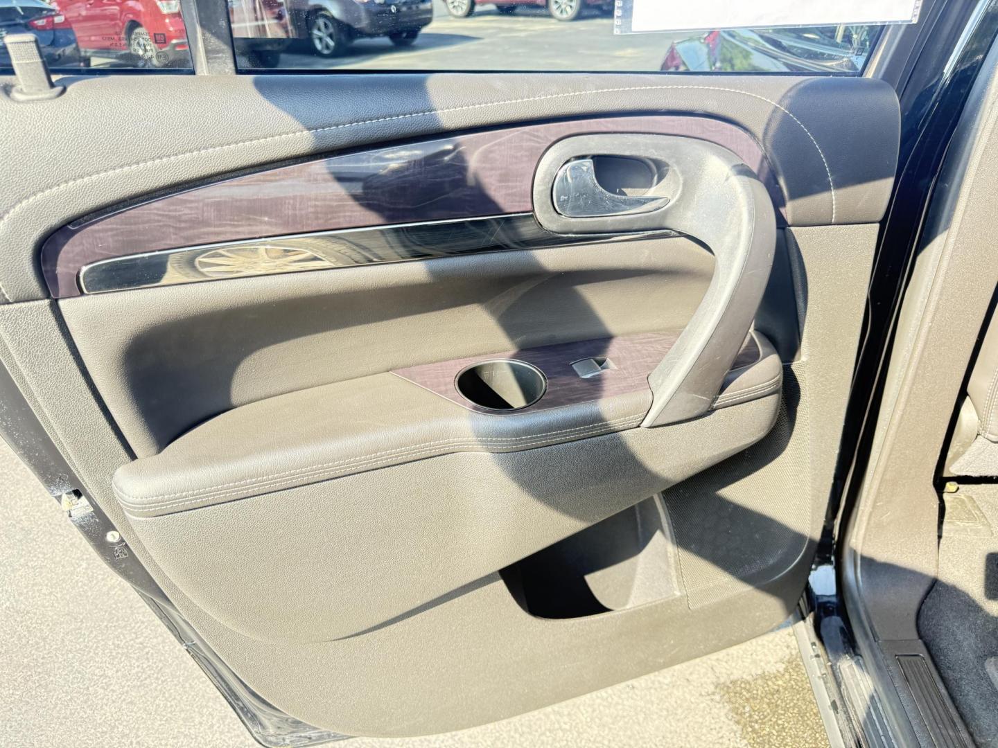 2017 Black /Black Buick Enclave Leather AWD (5GAKVBKD8HJ) with an 3.6L V6 DOHC 24V engine, 6A transmission, located at 547 E. Main St., Orwell, OH, 44076, (440) 437-5893, 41.535435, -80.847855 - This 2017 Buick Enclave Leather AWD is a well-equipped midsize SUV featuring a 3.6L V6 engine and 6-speed automatic transmission. It offers comfort and convenience with leather interior, power and heated front seats, tri-zone automatic climate control, and 2nd-row captain’s chairs. Technology high - Photo#35