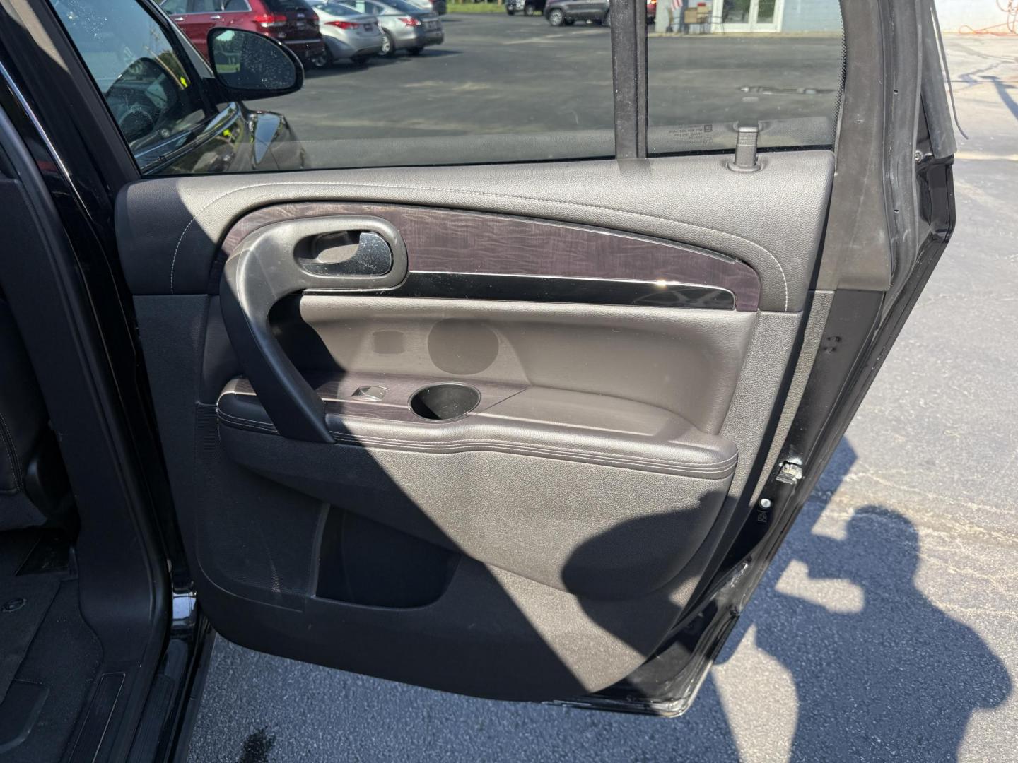 2017 Black /Black Buick Enclave Leather AWD (5GAKVBKD8HJ) with an 3.6L V6 DOHC 24V engine, 6A transmission, located at 547 E. Main St., Orwell, OH, 44076, (440) 437-5893, 41.535435, -80.847855 - This 2017 Buick Enclave Leather AWD is a well-equipped midsize SUV featuring a 3.6L V6 engine and 6-speed automatic transmission. It offers comfort and convenience with leather interior, power and heated front seats, tri-zone automatic climate control, and 2nd-row captain’s chairs. Technology high - Photo#39