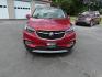 2017 Red /Tan Buick Encore Essence AWD (KL4CJGSBXHB) with an 1.4L I4 DOHC 16V TURBO engine, 6A transmission, located at 547 E. Main St., Orwell, OH, 44076, (440) 437-5893, 41.535435, -80.847855 - This 2017 Buick Encore Essence AWD is a stylish and versatile compact SUV featuring a 1.4-liter turbocharged I4 EcoTec engine paired with a smooth 6-speed automatic transmission, offering a commendable 31 MPG on the highway. Its luxurious leather interior, power driver’s seat, and an 8.0-inch touc - Photo#1