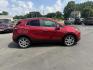 2017 Red /Tan Buick Encore Essence AWD (KL4CJGSBXHB) with an 1.4L I4 DOHC 16V TURBO engine, 6A transmission, located at 547 E. Main St., Orwell, OH, 44076, (440) 437-5893, 41.535435, -80.847855 - This 2017 Buick Encore Essence AWD is a stylish and versatile compact SUV featuring a 1.4-liter turbocharged I4 EcoTec engine paired with a smooth 6-speed automatic transmission, offering a commendable 31 MPG on the highway. Its luxurious leather interior, power driver’s seat, and an 8.0-inch touc - Photo#5