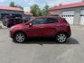 2017 Red /Tan Buick Encore Essence AWD (KL4CJGSBXHB) with an 1.4L I4 DOHC 16V TURBO engine, 6A transmission, located at 547 E. Main St., Orwell, OH, 44076, (440) 437-5893, 41.535435, -80.847855 - This 2017 Buick Encore Essence AWD is a stylish and versatile compact SUV featuring a 1.4-liter turbocharged I4 EcoTec engine paired with a smooth 6-speed automatic transmission, offering a commendable 31 MPG on the highway. Its luxurious leather interior, power driver’s seat, and an 8.0-inch touc - Photo#12