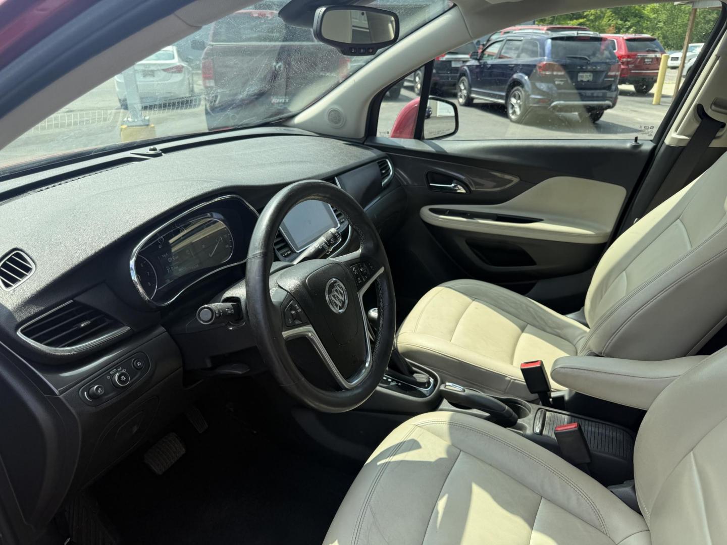 2017 Red /Tan Buick Encore Essence AWD (KL4CJGSBXHB) with an 1.4L I4 DOHC 16V TURBO engine, 6A transmission, located at 547 E. Main St., Orwell, OH, 44076, (440) 437-5893, 41.535435, -80.847855 - This 2017 Buick Encore Essence AWD is a stylish and versatile compact SUV featuring a 1.4-liter turbocharged I4 EcoTec engine paired with a smooth 6-speed automatic transmission, offering a commendable 31 MPG on the highway. Its luxurious leather interior, power driver’s seat, and an 8.0-inch touc - Photo#15