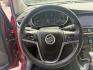 2017 Red /Tan Buick Encore Essence AWD (KL4CJGSBXHB) with an 1.4L I4 DOHC 16V TURBO engine, 6A transmission, located at 547 E. Main St., Orwell, OH, 44076, (440) 437-5893, 41.535435, -80.847855 - This 2017 Buick Encore Essence AWD is a stylish and versatile compact SUV featuring a 1.4-liter turbocharged I4 EcoTec engine paired with a smooth 6-speed automatic transmission, offering a commendable 31 MPG on the highway. Its luxurious leather interior, power driver’s seat, and an 8.0-inch touc - Photo#23