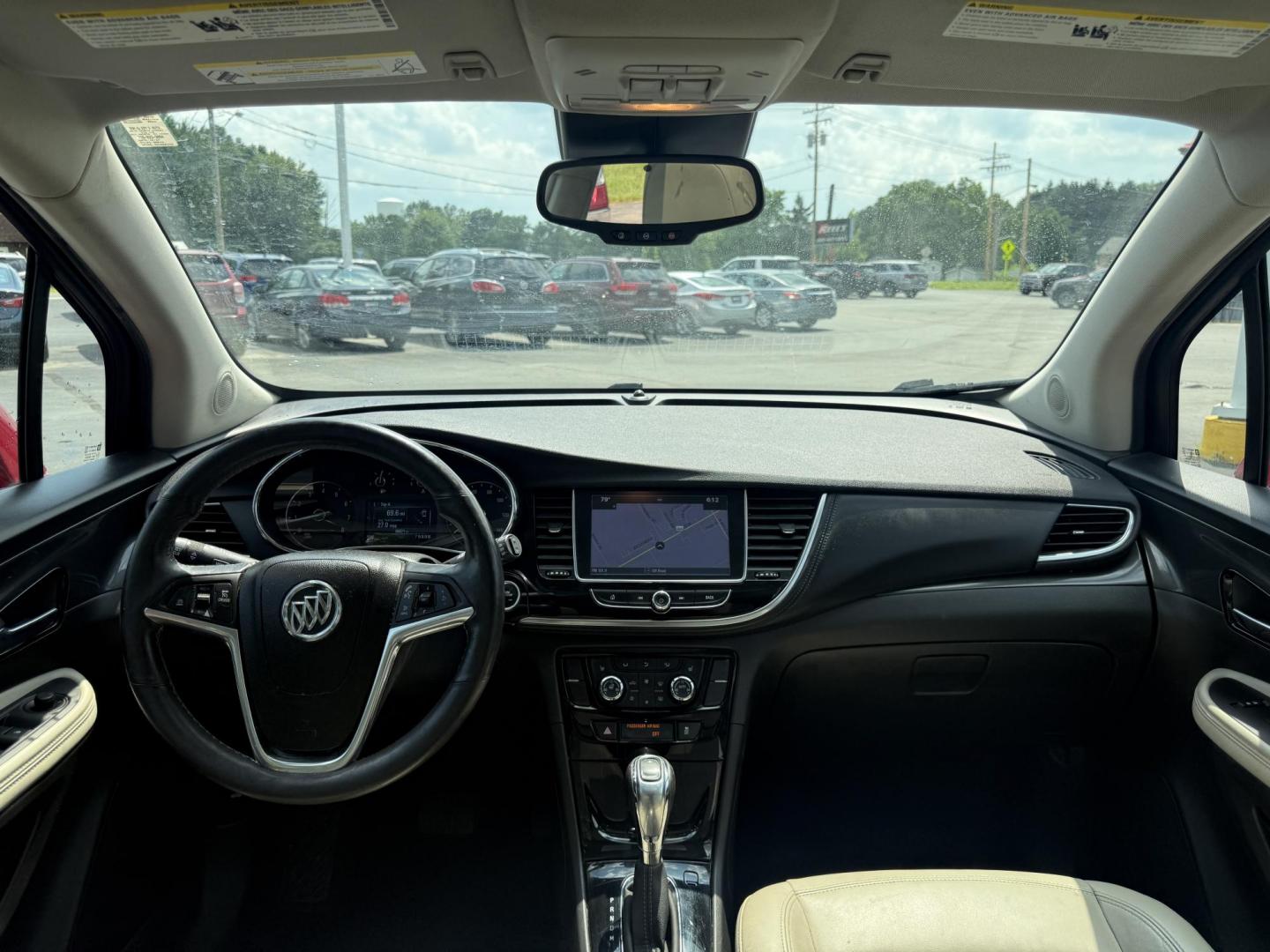 2017 Red /Tan Buick Encore Essence AWD (KL4CJGSBXHB) with an 1.4L I4 DOHC 16V TURBO engine, 6A transmission, located at 547 E. Main St., Orwell, OH, 44076, (440) 437-5893, 41.535435, -80.847855 - This 2017 Buick Encore Essence AWD is a stylish and versatile compact SUV featuring a 1.4-liter turbocharged I4 EcoTec engine paired with a smooth 6-speed automatic transmission, offering a commendable 31 MPG on the highway. Its luxurious leather interior, power driver’s seat, and an 8.0-inch touc - Photo#34