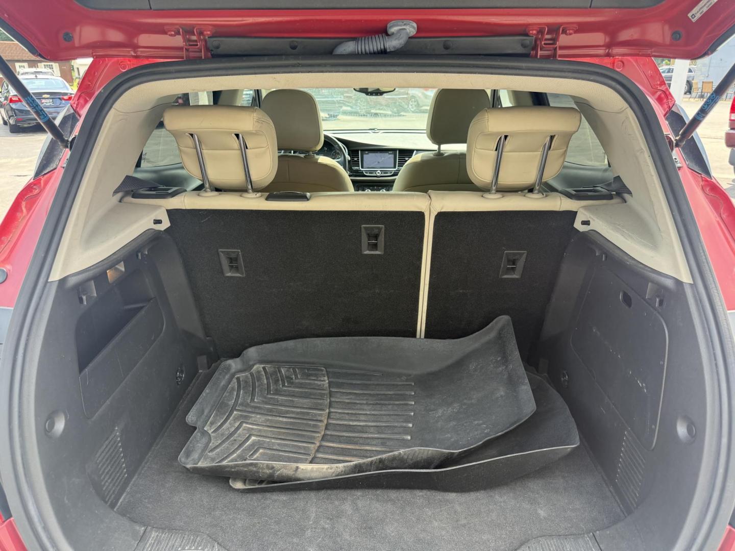 2017 Red /Tan Buick Encore Essence AWD (KL4CJGSBXHB) with an 1.4L I4 DOHC 16V TURBO engine, 6A transmission, located at 547 E. Main St., Orwell, OH, 44076, (440) 437-5893, 41.535435, -80.847855 - This 2017 Buick Encore Essence AWD is a stylish and versatile compact SUV featuring a 1.4-liter turbocharged I4 EcoTec engine paired with a smooth 6-speed automatic transmission, offering a commendable 31 MPG on the highway. Its luxurious leather interior, power driver’s seat, and an 8.0-inch touc - Photo#35