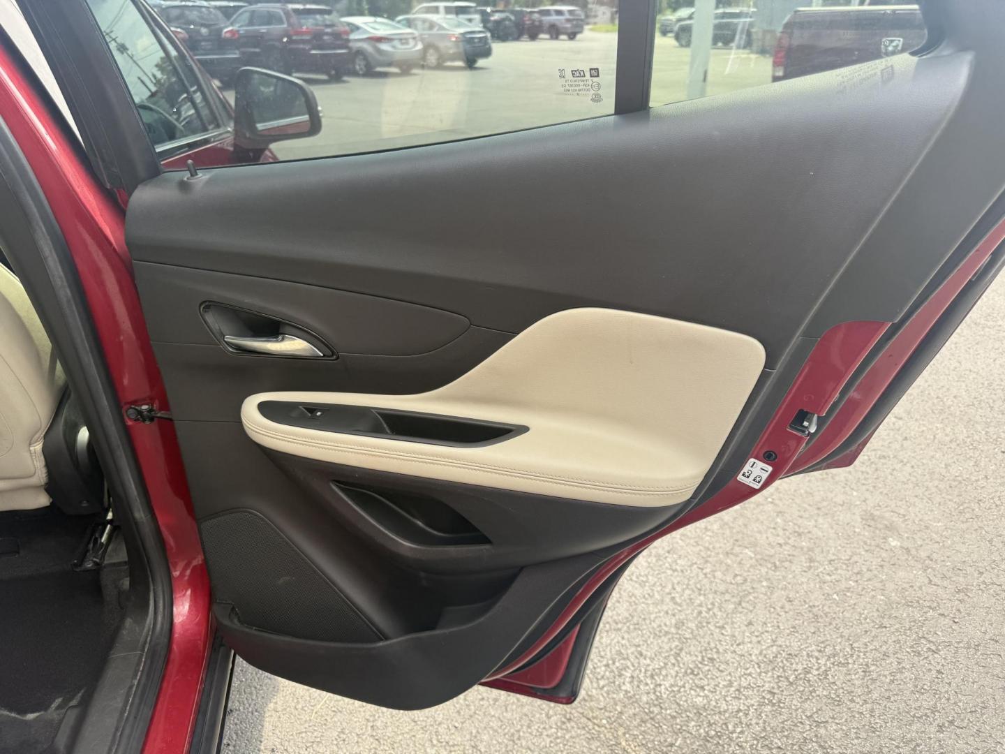 2017 Red /Tan Buick Encore Essence AWD (KL4CJGSBXHB) with an 1.4L I4 DOHC 16V TURBO engine, 6A transmission, located at 547 E. Main St., Orwell, OH, 44076, (440) 437-5893, 41.535435, -80.847855 - This 2017 Buick Encore Essence AWD is a stylish and versatile compact SUV featuring a 1.4-liter turbocharged I4 EcoTec engine paired with a smooth 6-speed automatic transmission, offering a commendable 31 MPG on the highway. Its luxurious leather interior, power driver’s seat, and an 8.0-inch touc - Photo#38