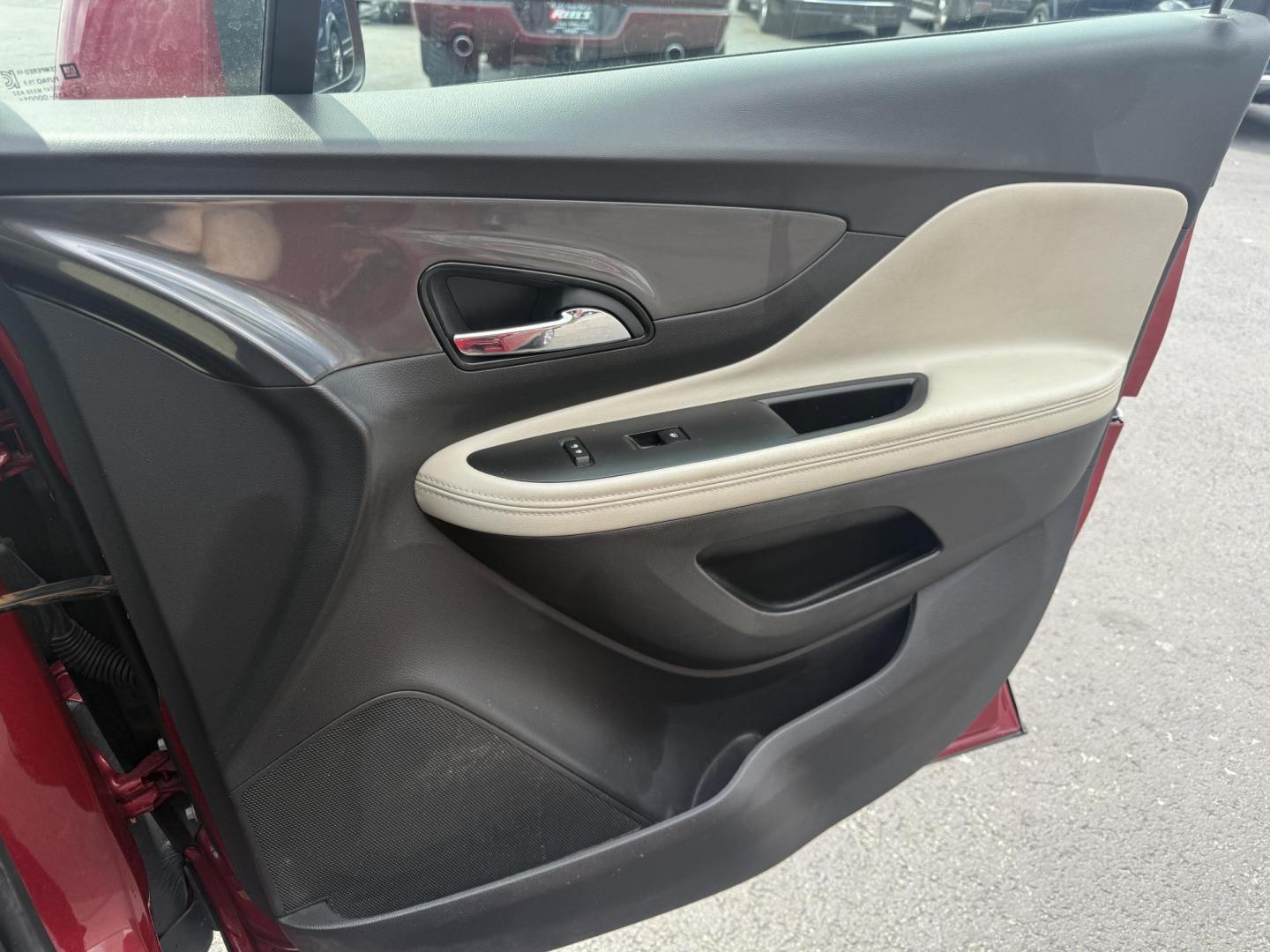 2017 Red /Tan Buick Encore Essence AWD (KL4CJGSBXHB) with an 1.4L I4 DOHC 16V TURBO engine, 6A transmission, located at 547 E. Main St., Orwell, OH, 44076, (440) 437-5893, 41.535435, -80.847855 - This 2017 Buick Encore Essence AWD is a stylish and versatile compact SUV featuring a 1.4-liter turbocharged I4 EcoTec engine paired with a smooth 6-speed automatic transmission, offering a commendable 31 MPG on the highway. Its luxurious leather interior, power driver’s seat, and an 8.0-inch touc - Photo#42