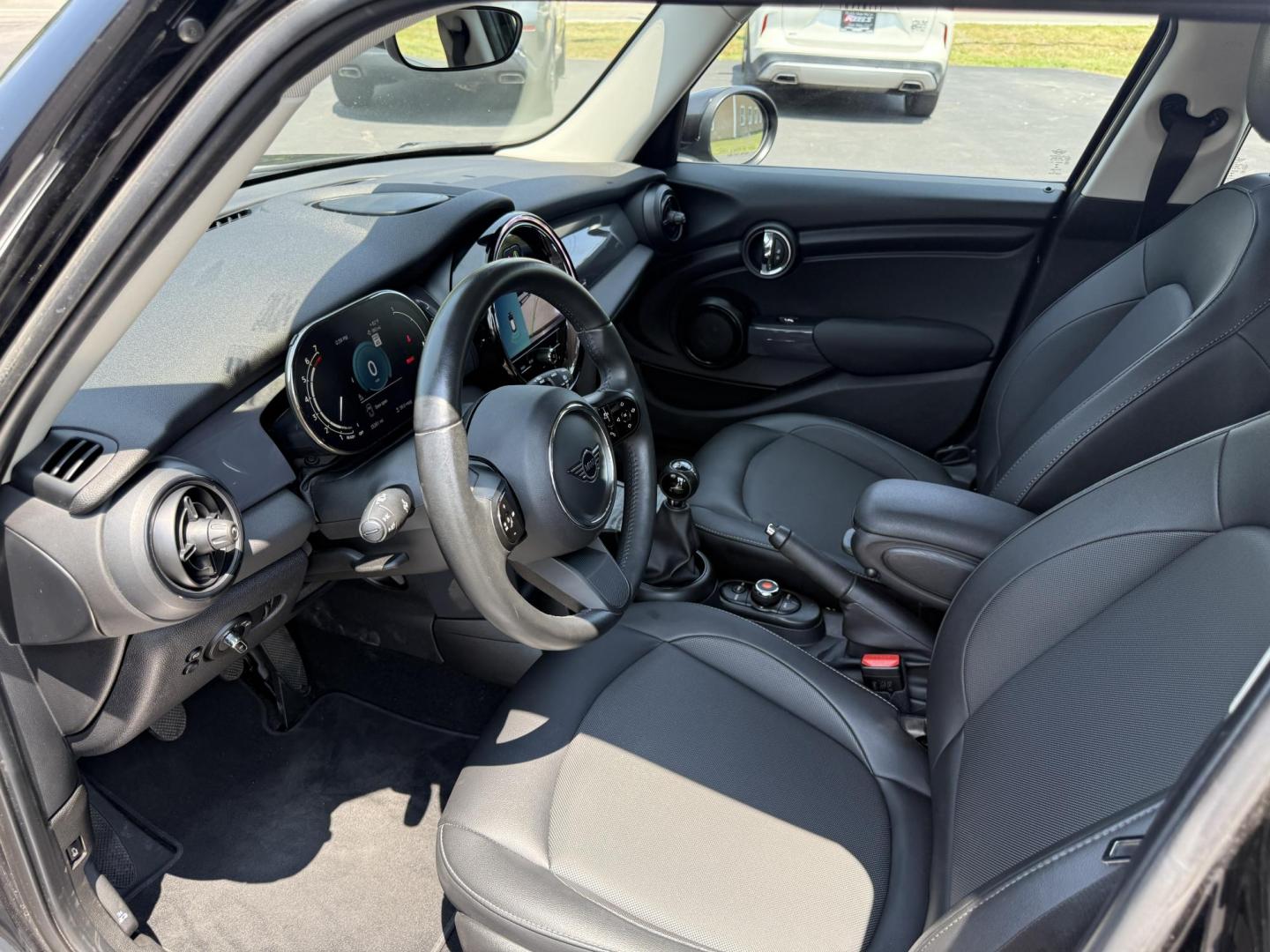 2022 Black /Black Mini Hardtop Cooper 4 Door (WMW33DK02N2) with an 1.5L I3 DOHC 12V TURBO engine, 6 Speed Manual transmission, located at 11115 Chardon Rd. , Chardon, OH, 44024, (440) 214-9705, 41.580246, -81.241943 - This One Owner 2022 Mini Cooper Hardtop 4 Door with a 1.5-liter turbocharged I3 engine and 6-speed manual transmission offers a fun, sporty driving experience combined with practical features like full LED exterior lighting, Apple CarPlay, Android Auto, and a backup camera. It delivers impressive fu - Photo#7