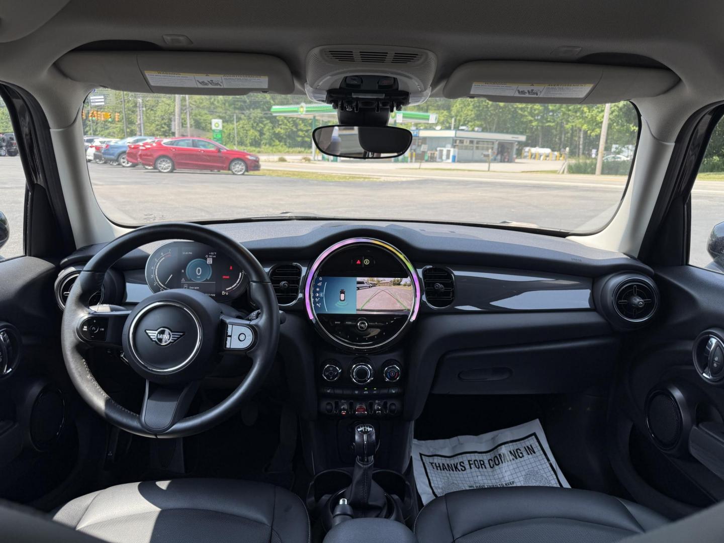 2022 Black /Black Mini Hardtop Cooper 4 Door (WMW33DK02N2) with an 1.5L I3 DOHC 12V TURBO engine, 6 Speed Manual transmission, located at 11115 Chardon Rd. , Chardon, OH, 44024, (440) 214-9705, 41.580246, -81.241943 - This One Owner 2022 Mini Cooper Hardtop 4 Door with a 1.5-liter turbocharged I3 engine and 6-speed manual transmission offers a fun, sporty driving experience combined with practical features like full LED exterior lighting, Apple CarPlay, Android Auto, and a backup camera. It delivers impressive fu - Photo#21