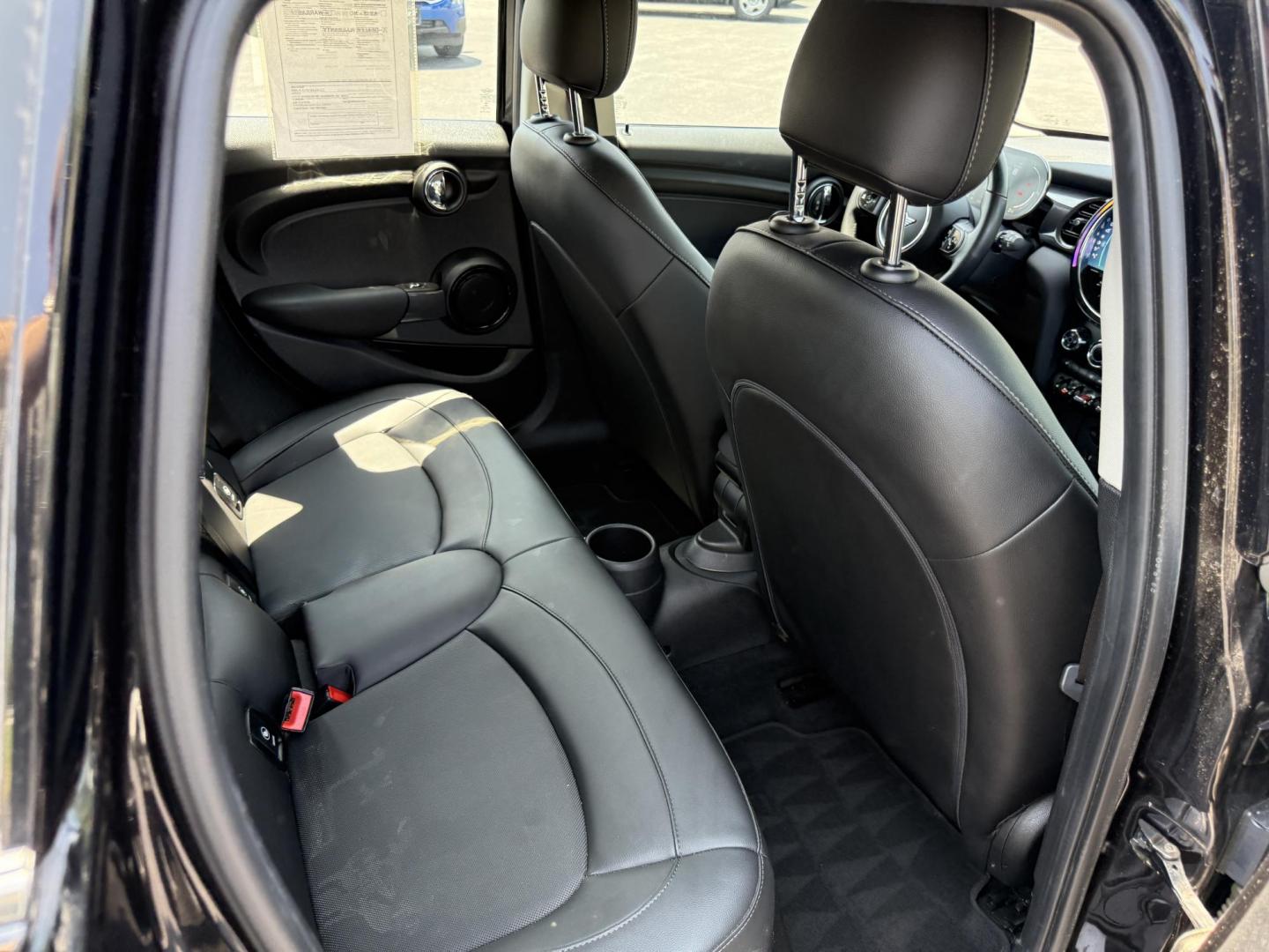 2022 Black /Black Mini Hardtop Cooper 4 Door (WMW33DK02N2) with an 1.5L I3 DOHC 12V TURBO engine, 6 Speed Manual transmission, located at 11115 Chardon Rd. , Chardon, OH, 44024, (440) 214-9705, 41.580246, -81.241943 - This One Owner 2022 Mini Cooper Hardtop 4 Door with a 1.5-liter turbocharged I3 engine and 6-speed manual transmission offers a fun, sporty driving experience combined with practical features like full LED exterior lighting, Apple CarPlay, Android Auto, and a backup camera. It delivers impressive fu - Photo#24