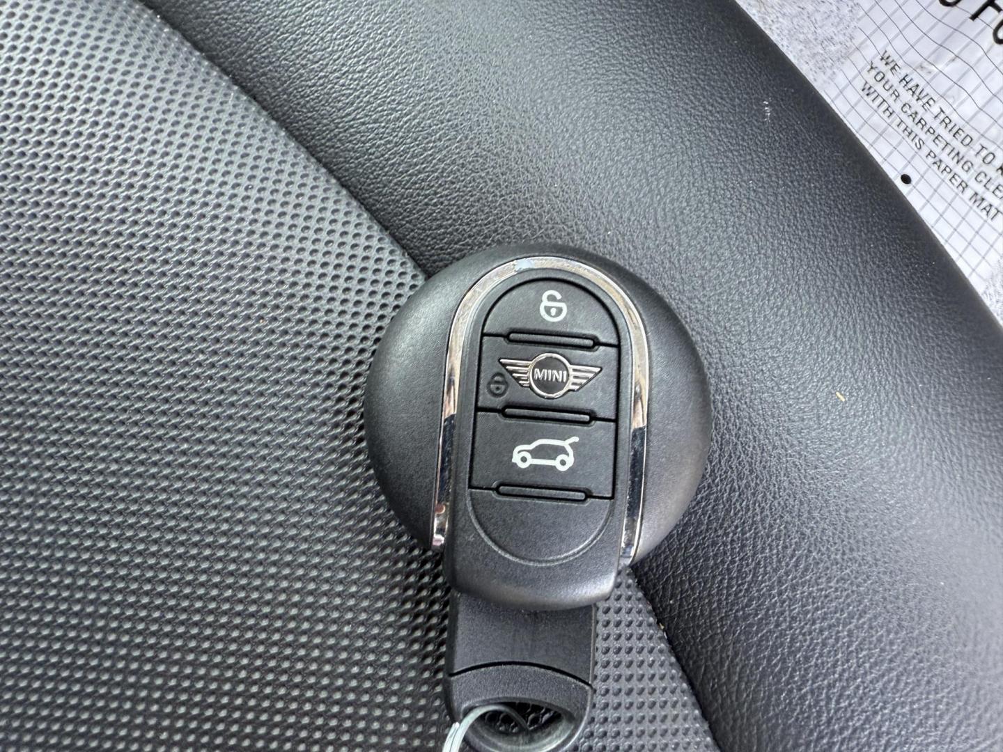 2022 Black /Black Mini Hardtop Cooper 4 Door (WMW33DK02N2) with an 1.5L I3 DOHC 12V TURBO engine, 6 Speed Manual transmission, located at 11115 Chardon Rd. , Chardon, OH, 44024, (440) 214-9705, 41.580246, -81.241943 - This One Owner 2022 Mini Cooper Hardtop 4 Door with a 1.5-liter turbocharged I3 engine and 6-speed manual transmission offers a fun, sporty driving experience combined with practical features like full LED exterior lighting, Apple CarPlay, Android Auto, and a backup camera. It delivers impressive fu - Photo#29
