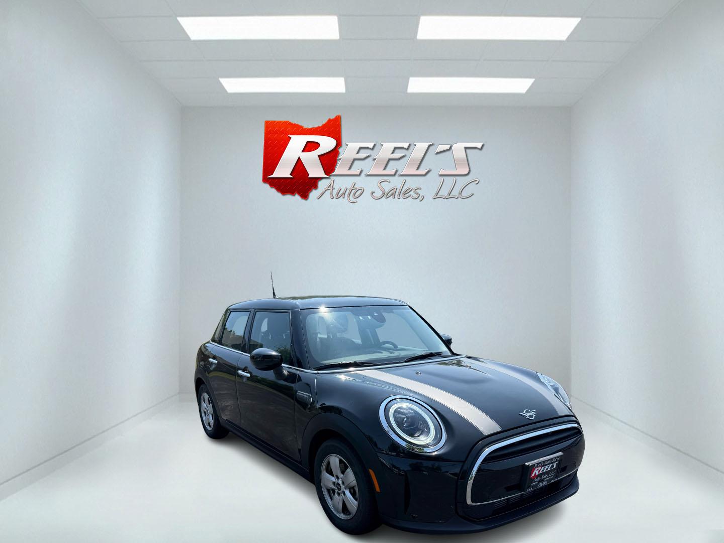 2022 Black /Black Mini Hardtop Cooper 4 Door (WMW33DK02N2) with an 1.5L I3 DOHC 12V TURBO engine, 6 Speed Manual transmission, located at 11115 Chardon Rd. , Chardon, OH, 44024, (440) 214-9705, 41.580246, -81.241943 - This One Owner 2022 Mini Cooper Hardtop 4 Door with a 1.5-liter turbocharged I3 engine and 6-speed manual transmission offers a fun, sporty driving experience combined with practical features like full LED exterior lighting, Apple CarPlay, Android Auto, and a backup camera. It delivers impressive fu - Photo#2