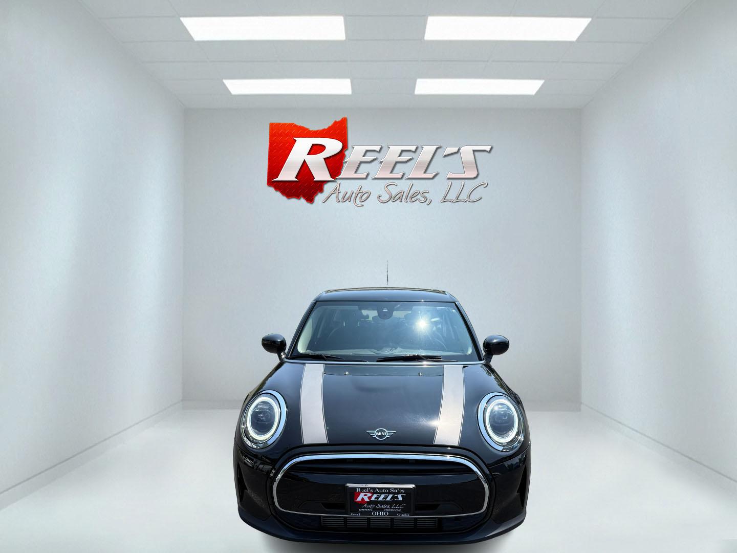 2022 Black /Black Mini Hardtop Cooper 4 Door (WMW33DK02N2) with an 1.5L I3 DOHC 12V TURBO engine, 6 Speed Manual transmission, located at 11115 Chardon Rd. , Chardon, OH, 44024, (440) 214-9705, 41.580246, -81.241943 - This One Owner 2022 Mini Cooper Hardtop 4 Door with a 1.5-liter turbocharged I3 engine and 6-speed manual transmission offers a fun, sporty driving experience combined with practical features like full LED exterior lighting, Apple CarPlay, Android Auto, and a backup camera. It delivers impressive fu - Photo#1