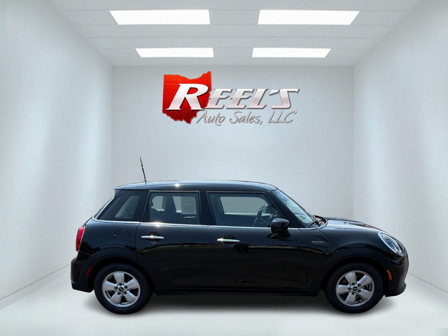 2022 Black /Black Mini Hardtop Cooper 4 Door (WMW33DK02N2) with an 1.5L I3 DOHC 12V TURBO engine, 6 Speed Manual transmission, located at 11115 Chardon Rd. , Chardon, OH, 44024, (440) 214-9705, 41.580246, -81.241943 - This One Owner 2022 Mini Cooper Hardtop 4 Door with a 1.5-liter turbocharged I3 engine and 6-speed manual transmission offers a fun, sporty driving experience combined with practical features like full LED exterior lighting, Apple CarPlay, Android Auto, and a backup camera. It delivers impressive fu - Photo#32