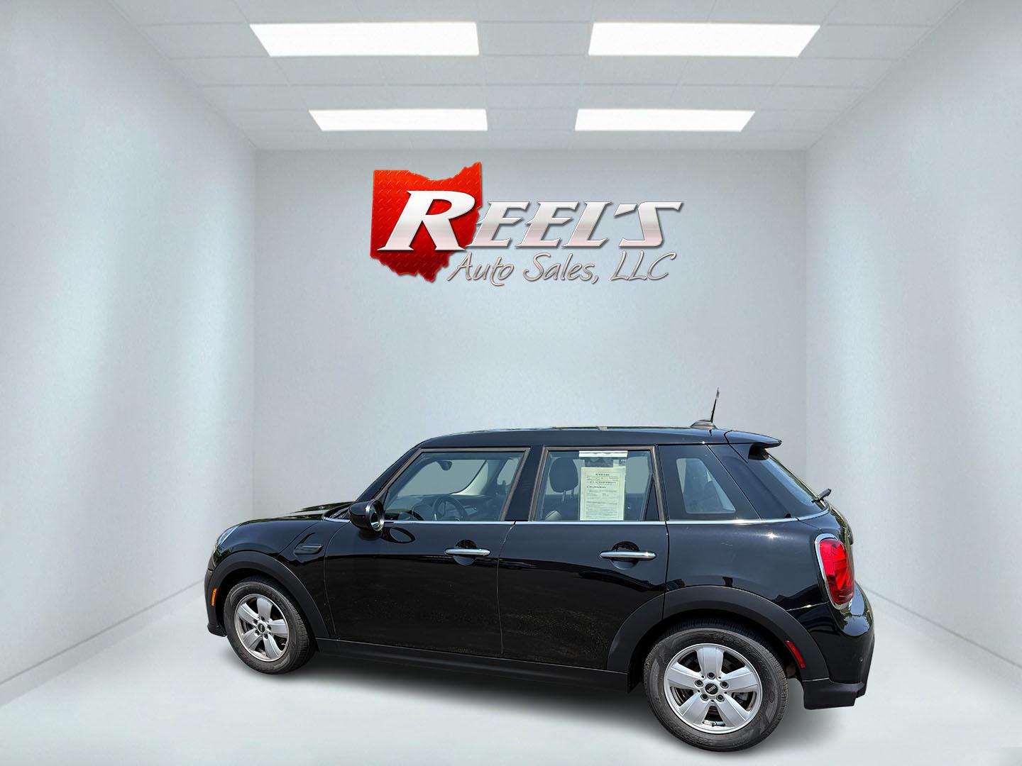 2022 Black /Black Mini Hardtop Cooper 4 Door (WMW33DK02N2) with an 1.5L I3 DOHC 12V TURBO engine, 6 Speed Manual transmission, located at 11115 Chardon Rd. , Chardon, OH, 44024, (440) 214-9705, 41.580246, -81.241943 - This One Owner 2022 Mini Cooper Hardtop 4 Door with a 1.5-liter turbocharged I3 engine and 6-speed manual transmission offers a fun, sporty driving experience combined with practical features like full LED exterior lighting, Apple CarPlay, Android Auto, and a backup camera. It delivers impressive fu - Photo#36