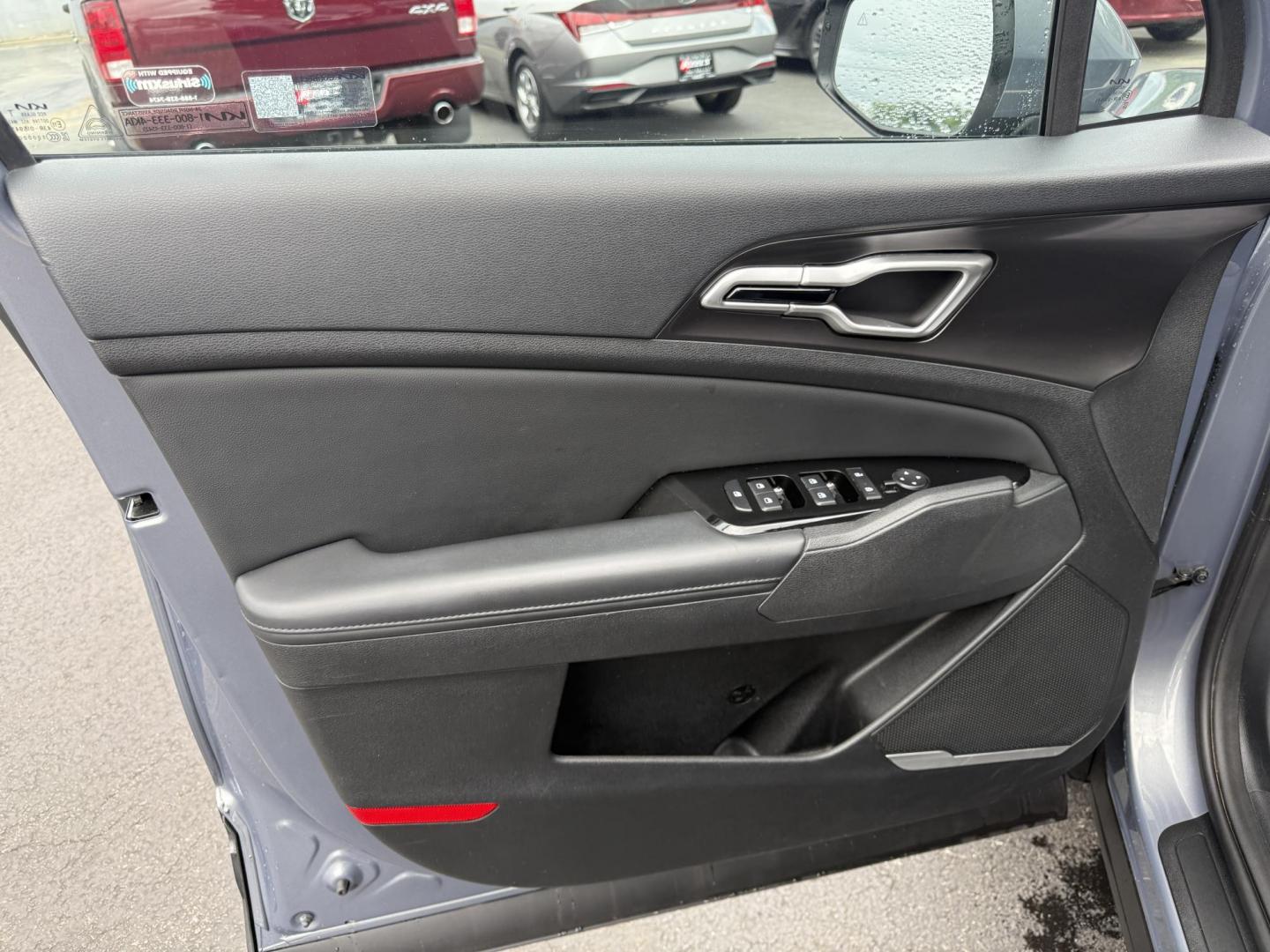 2023 Silver /Black Kia Sportage EX AWD (5XYK3CAF7PG) with an 2.5L I4 DOHC 16V engine, 8-Speed Automatic transmission, located at 547 E. Main St., Orwell, OH, 44076, (440) 437-5893, 41.535435, -80.847855 - Photo#17
