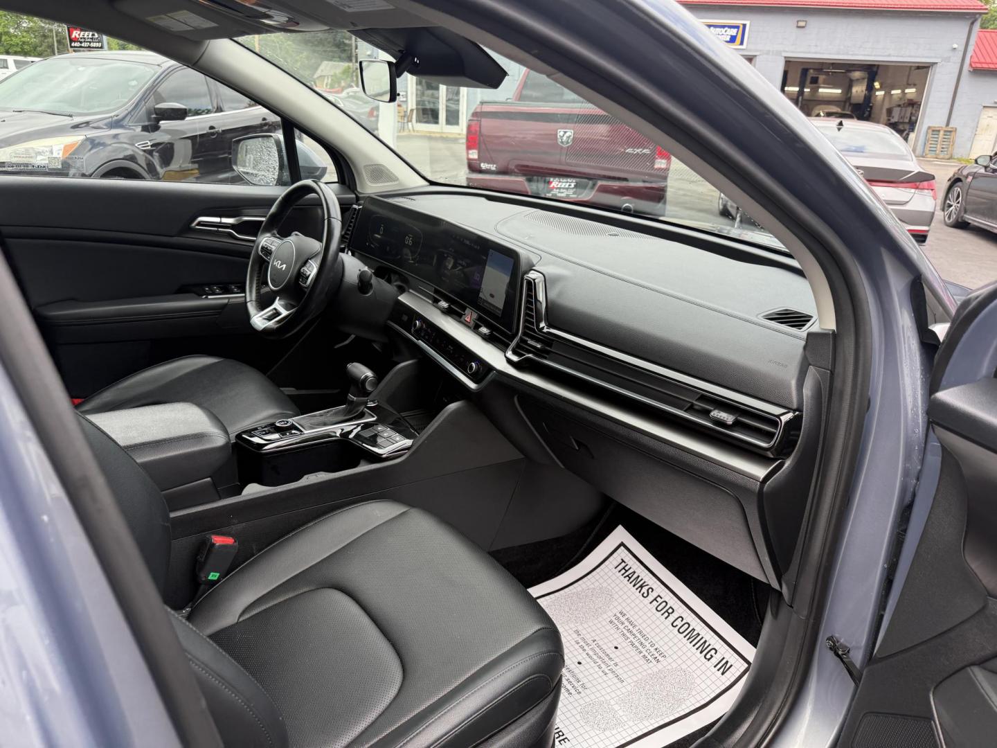 2023 Silver /Black Kia Sportage EX AWD (5XYK3CAF7PG) with an 2.5L I4 DOHC 16V engine, 8-Speed Automatic transmission, located at 547 E. Main St., Orwell, OH, 44076, (440) 437-5893, 41.535435, -80.847855 - Photo#42