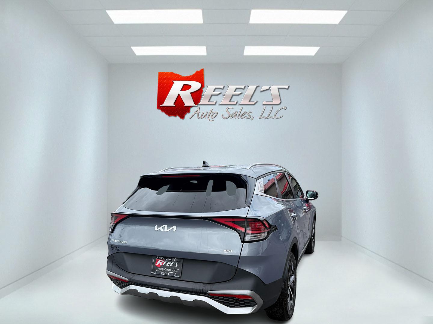 2023 Silver /Black Kia Sportage EX AWD (5XYK3CAF7PG) with an 2.5L I4 DOHC 16V engine, 8-Speed Automatic transmission, located at 547 E. Main St., Orwell, OH, 44076, (440) 437-5893, 41.535435, -80.847855 - Photo#7
