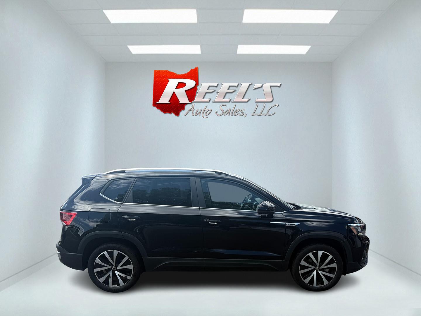 2022 Black /Black Volkswagen Taos SE 4Motion (3VVWX7B23NM) with an 1.5L I4 SFI DOHC 16V Turbo engine, 7 Speed Automatic transmission, located at 547 E. Main St., Orwell, OH, 44076, (440) 437-5893, 41.535435, -80.847855 - This 2022 Volkswagen Taos SE 4Motion features a turbocharged 1.5-liter I4 engine paired with a 7-speed automatic transmission, delivering an estimated 32 MPG highway, with advanced all-wheel-drive capabilities. It offers heated front seats, an 8.0-inch touchscreen with Apple CarPlay and Android Auto - Photo#5