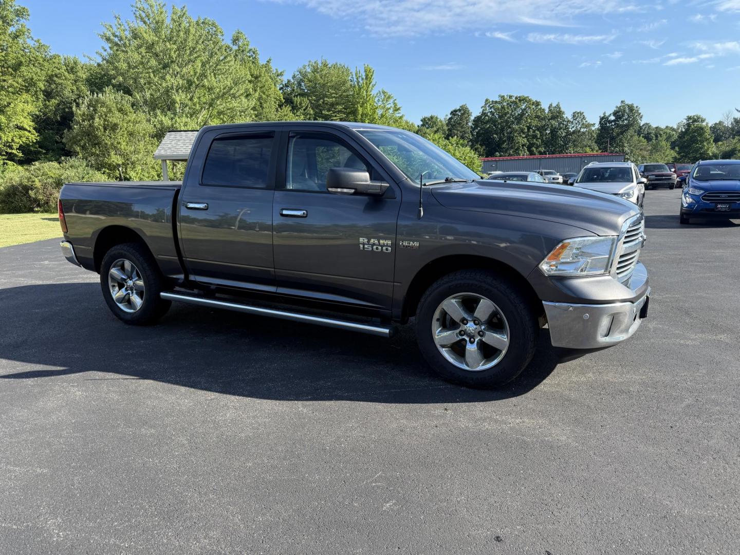 2016 Gray /Gray RAM 1500 Big Horn Crew Cab SWB 4WD (1C6RR7LT2GS) with an 5.7L V8 OHV 16V engine, 8-Speed Automatic transmission, located at 11115 Chardon Rd. , Chardon, OH, 44024, (440) 214-9705, 41.580246, -81.241943 - This One Owner 2016 Ram 1500 Big Horn Crew Cab 5.7 HEMI V8 combines powerful performance with advanced features, featuring an 8-speed automatic transmission, a formidable 8,010-pound towing capacity, and a 5.7-liter HEMI V8 engine. It offers modern technology including an 8.4-inch touchscreen infota - Photo#3
