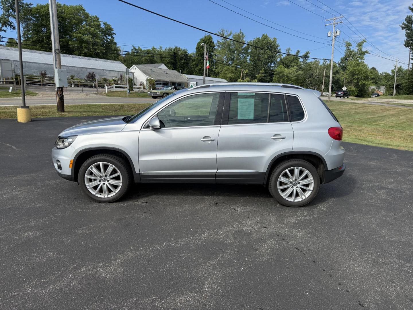 2016 Silver /Black Volkswagen Tiguan SE 4Motion (WVGBV7AX5GW) with an 2.0L I4 DOHC 16V TURBO engine, 6-Speed Automatic transmission, located at 11115 Chardon Rd. , Chardon, OH, 44024, (440) 214-9705, 41.580246, -81.241943 - This 2016 Volkswagen Tiguan SE 4Motion is a versatile compact SUV powered by a 2.0-liter turbocharged I4 engine paired with a 6-speed automatic transmission, offering confident all-wheel-drive capability with 4Motion. It features a refined leather interior, heated front seats, and power-adjustable f - Photo#12