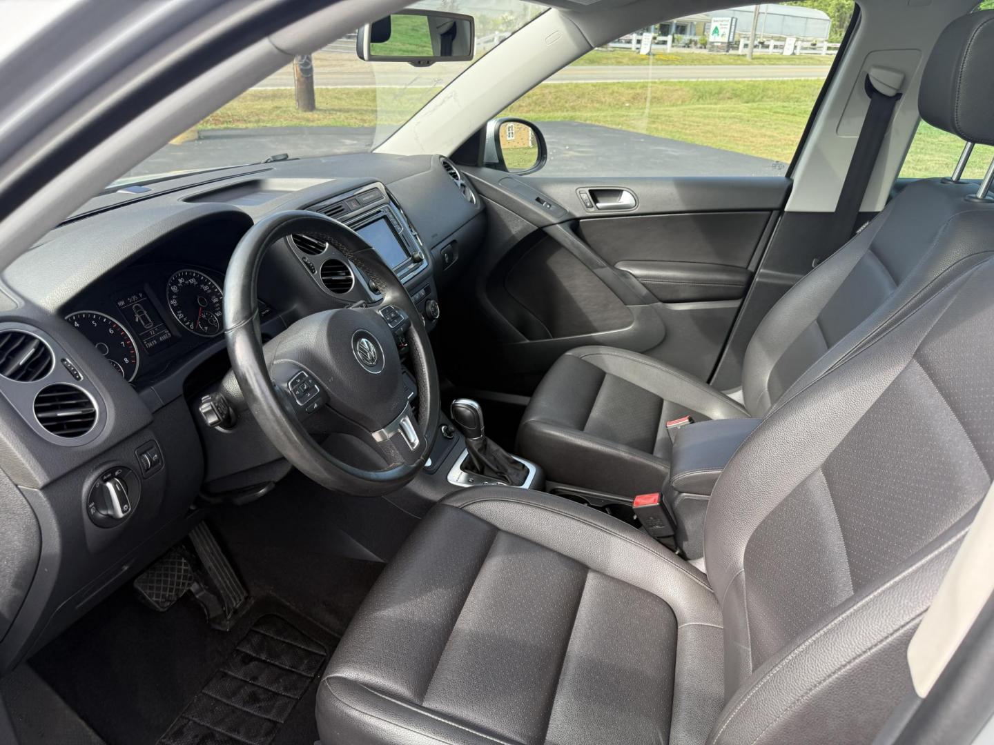 2016 Silver /Black Volkswagen Tiguan SE 4Motion (WVGBV7AX5GW) with an 2.0L I4 DOHC 16V TURBO engine, 6-Speed Automatic transmission, located at 11115 Chardon Rd. , Chardon, OH, 44024, (440) 214-9705, 41.580246, -81.241943 - This 2016 Volkswagen Tiguan SE 4Motion is a versatile compact SUV powered by a 2.0-liter turbocharged I4 engine paired with a 6-speed automatic transmission, offering confident all-wheel-drive capability with 4Motion. It features a refined leather interior, heated front seats, and power-adjustable f - Photo#15