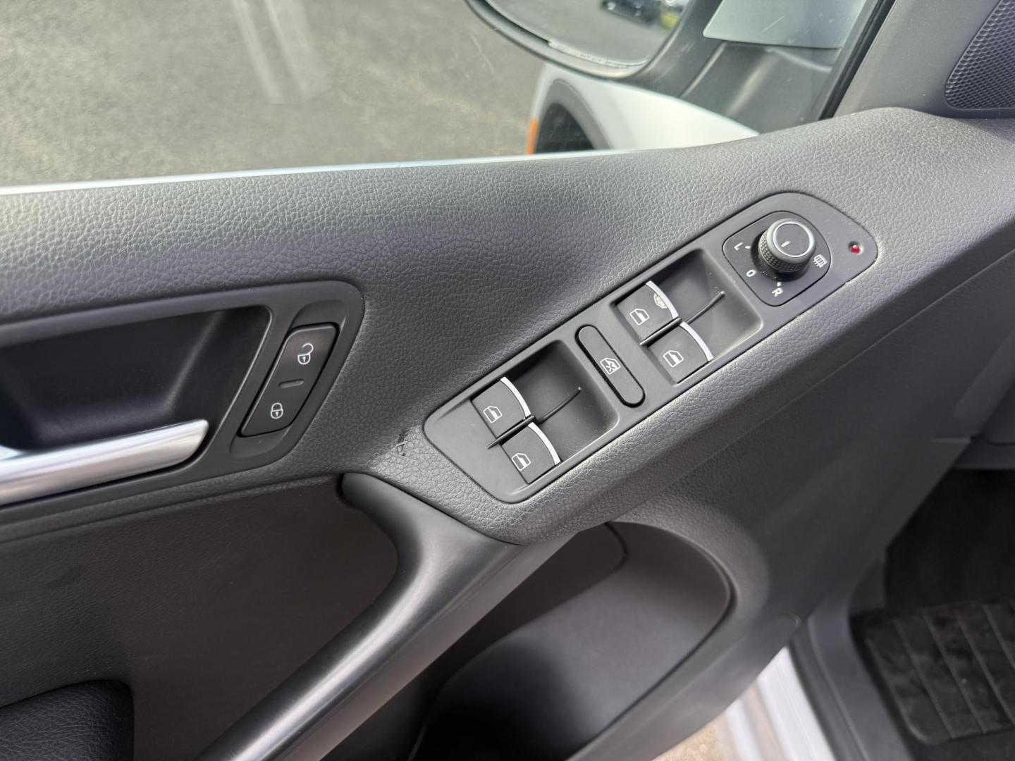 2016 Silver /Black Volkswagen Tiguan SE 4Motion (WVGBV7AX5GW) with an 2.0L I4 DOHC 16V TURBO engine, 6-Speed Automatic transmission, located at 11115 Chardon Rd. , Chardon, OH, 44024, (440) 214-9705, 41.580246, -81.241943 - This 2016 Volkswagen Tiguan SE 4Motion is a versatile compact SUV powered by a 2.0-liter turbocharged I4 engine paired with a 6-speed automatic transmission, offering confident all-wheel-drive capability with 4Motion. It features a refined leather interior, heated front seats, and power-adjustable f - Photo#17