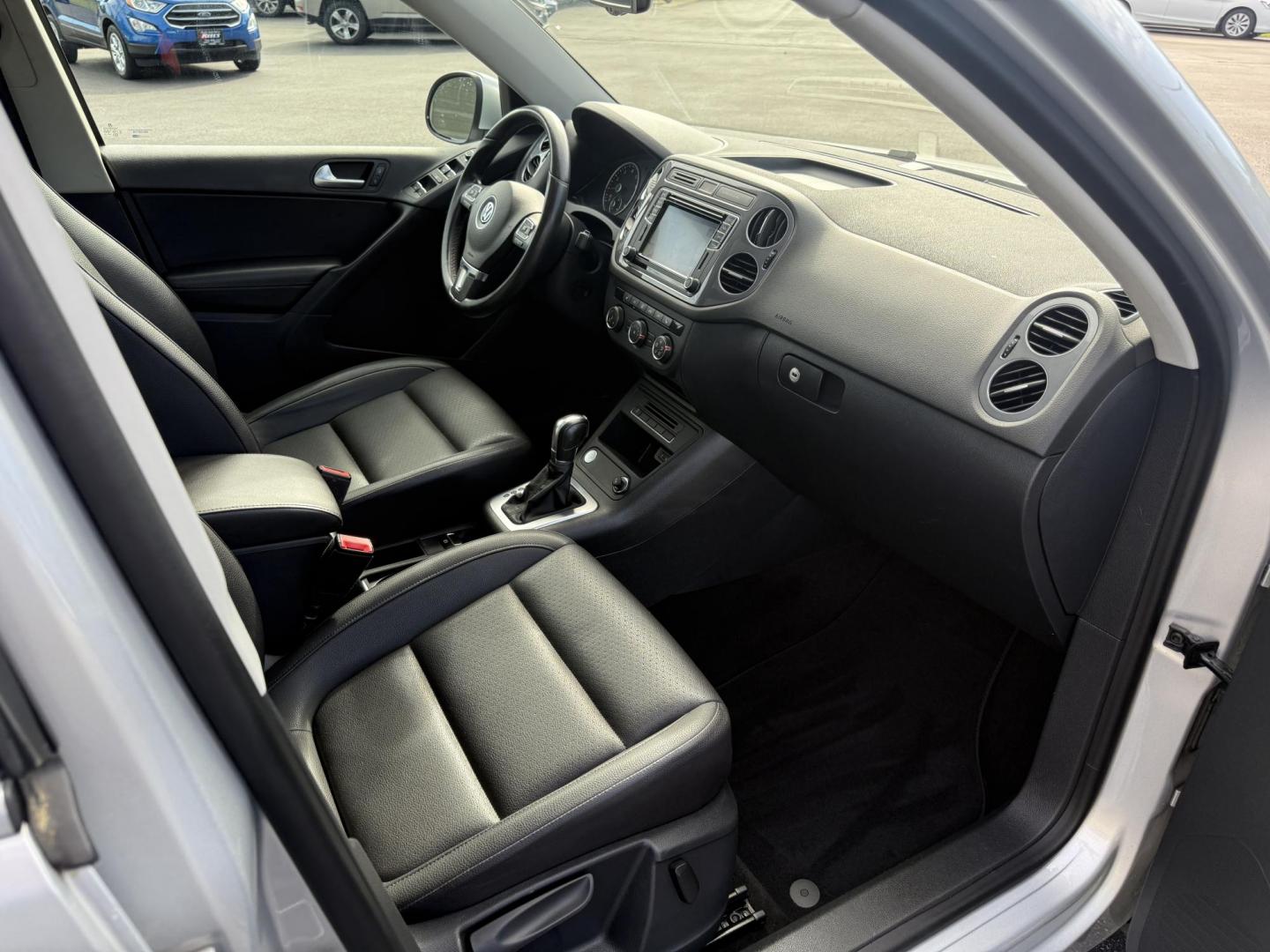 2016 Silver /Black Volkswagen Tiguan SE 4Motion (WVGBV7AX5GW) with an 2.0L I4 DOHC 16V TURBO engine, 6-Speed Automatic transmission, located at 11115 Chardon Rd. , Chardon, OH, 44024, (440) 214-9705, 41.580246, -81.241943 - This 2016 Volkswagen Tiguan SE 4Motion is a versatile compact SUV powered by a 2.0-liter turbocharged I4 engine paired with a 6-speed automatic transmission, offering confident all-wheel-drive capability with 4Motion. It features a refined leather interior, heated front seats, and power-adjustable f - Photo#40