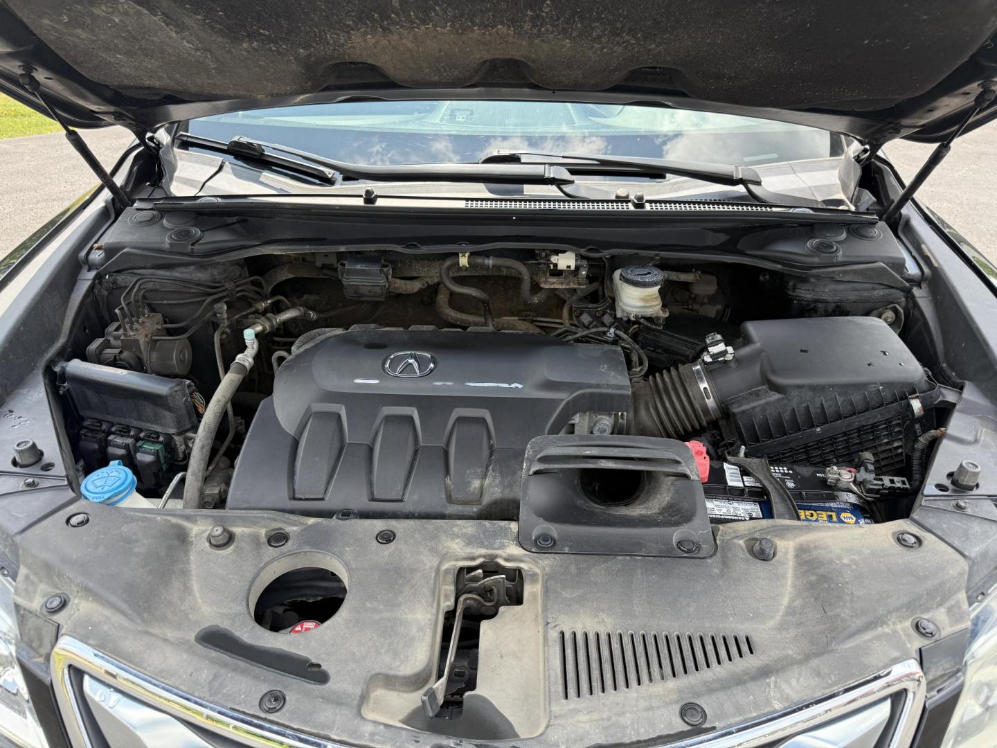 2016 Black /Black Acura RDX 6-Spd AT AWD w/Advance Package (5J8TB4H70GL) with an 3.5L V6 SOHC 24V engine, 6-Speed Automatic transmission, located at 547 E. Main St., Orwell, OH, 44076, (440) 437-5893, 41.535435, -80.847855 - This One Owner 2016 Acura RDX with the Advance Package AWD combines luxury, performance, and advanced technology, powered by a 3.5-liter V6 engine paired with a 6-speed automatic transmission, achieving 0-60 mph in approximately 6.2 seconds. It features a premium leather interior, dual-zone automati - Photo#13