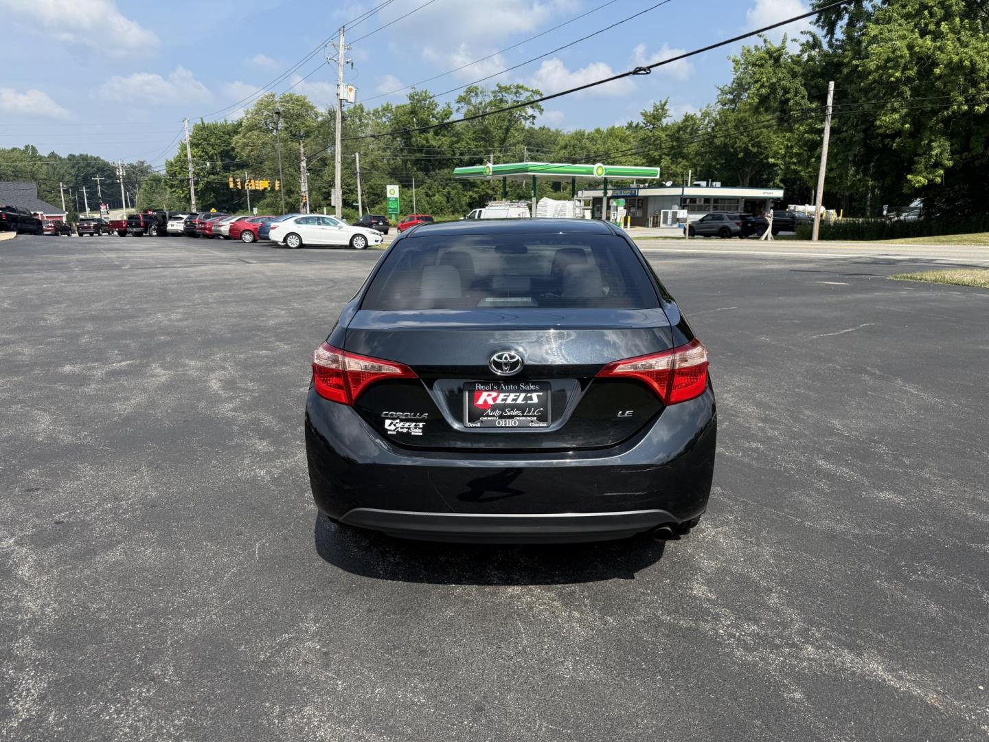 2017 Black /Gray Toyota Corolla LE CVT (2T1BURHE5HC) with an 1.8L I4 DOHC 16V engine, Automatic transmission, located at 11115 Chardon Rd. , Chardon, OH, 44024, (440) 214-9705, 41.580246, -81.241943 - This 2017 Toyota Corolla LE offers a reliable and efficient drive with its 1.8L I4 engine, achieving up to 36 MPG on the highway. Key features include advanced safety tech like lane departure warning, forward collision warning, and adaptive cruise control, as well as eight standard airbags and a bac - Photo#7