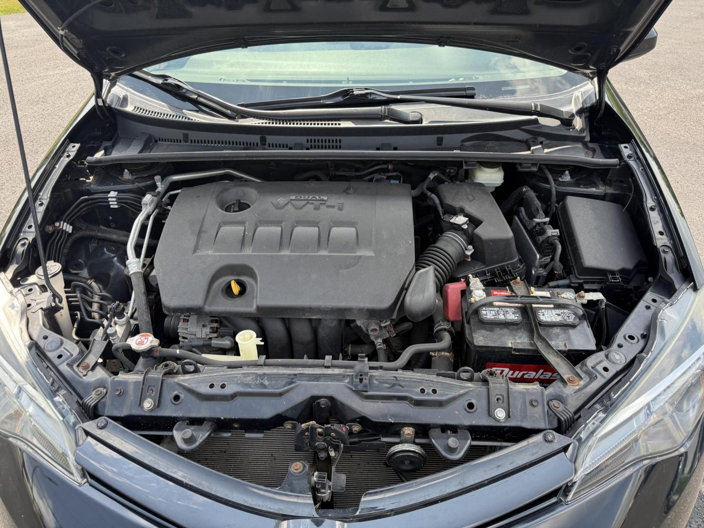2017 Black /Gray Toyota Corolla LE CVT (2T1BURHE5HC) with an 1.8L I4 DOHC 16V engine, Automatic transmission, located at 11115 Chardon Rd. , Chardon, OH, 44024, (440) 214-9705, 41.580246, -81.241943 - This 2017 Toyota Corolla LE offers a reliable and efficient drive with its 1.8L I4 engine, achieving up to 36 MPG on the highway. Key features include advanced safety tech like lane departure warning, forward collision warning, and adaptive cruise control, as well as eight standard airbags and a bac - Photo#13