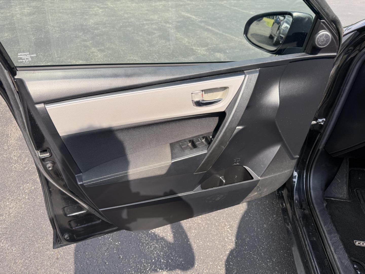 2017 Black /Gray Toyota Corolla LE CVT (2T1BURHE5HC) with an 1.8L I4 DOHC 16V engine, Automatic transmission, located at 11115 Chardon Rd. , Chardon, OH, 44024, (440) 214-9705, 41.580246, -81.241943 - This 2017 Toyota Corolla LE offers a reliable and efficient drive with its 1.8L I4 engine, achieving up to 36 MPG on the highway. Key features include advanced safety tech like lane departure warning, forward collision warning, and adaptive cruise control, as well as eight standard airbags and a bac - Photo#15