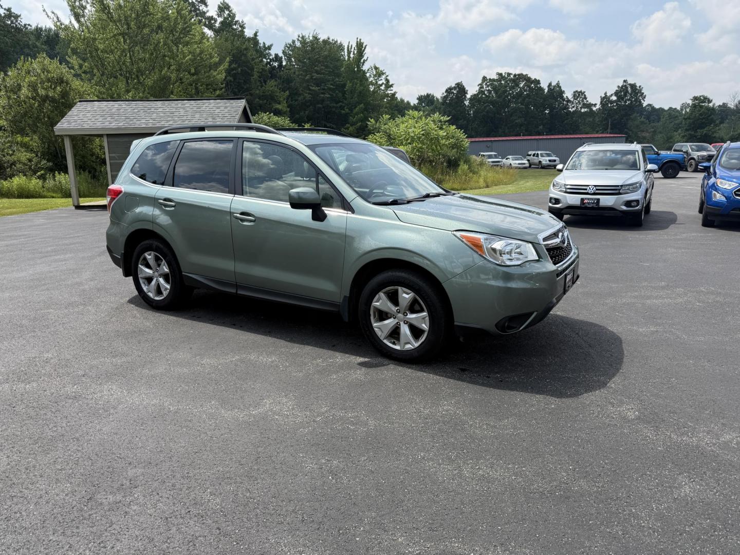 2016 Green /Gray Subaru Forester 2.5i Limited (JF2SJAHC9GH) with an 2.5L H4 DOHC 16V engine, Automatic transmission, located at 11115 Chardon Rd. , Chardon, OH, 44024, (440) 214-9705, 41.580246, -81.241943 - Photo#3