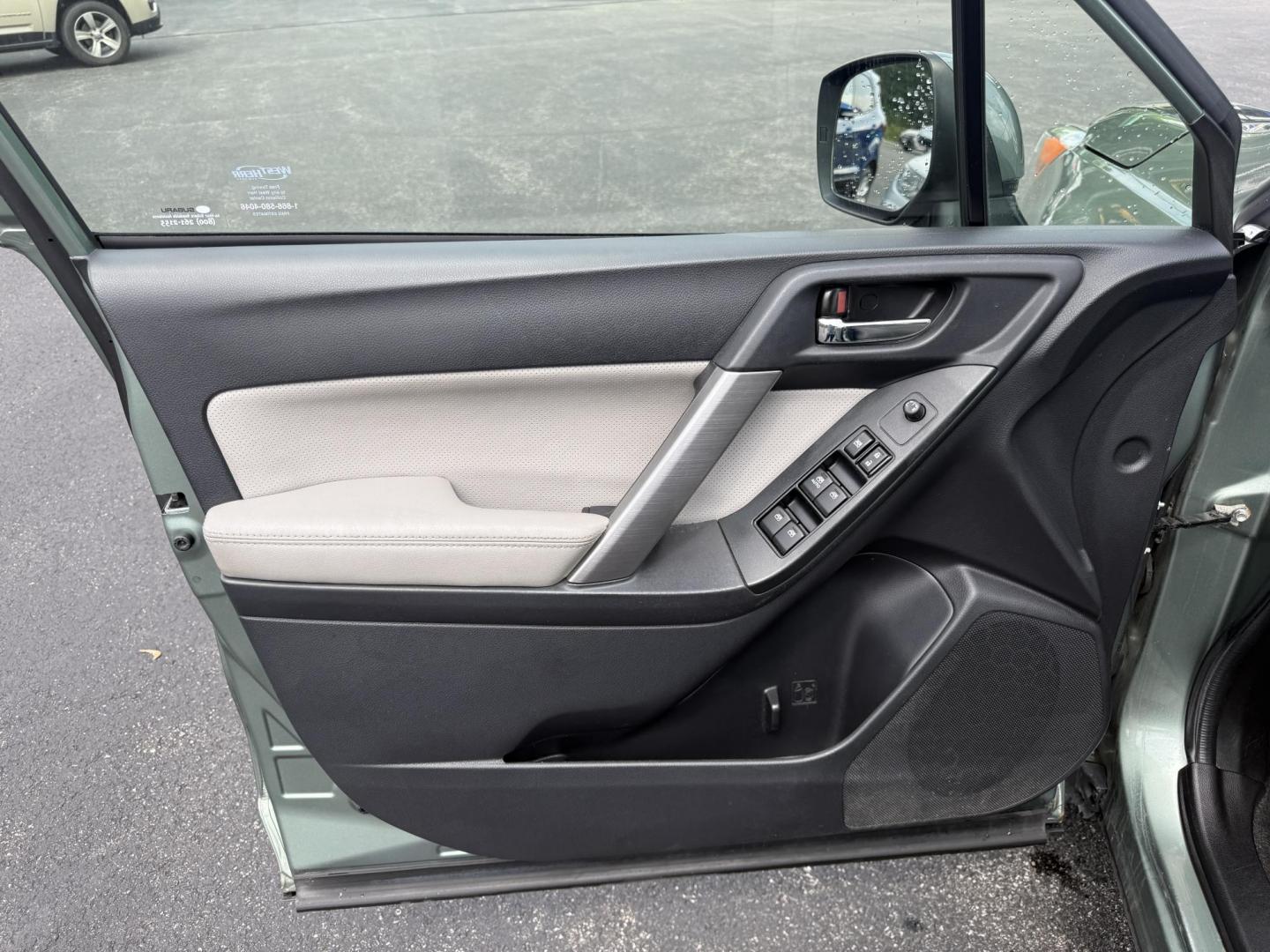 2016 Green /Gray Subaru Forester 2.5i Limited (JF2SJAHC9GH) with an 2.5L H4 DOHC 16V engine, Automatic transmission, located at 11115 Chardon Rd. , Chardon, OH, 44024, (440) 214-9705, 41.580246, -81.241943 - Photo#16