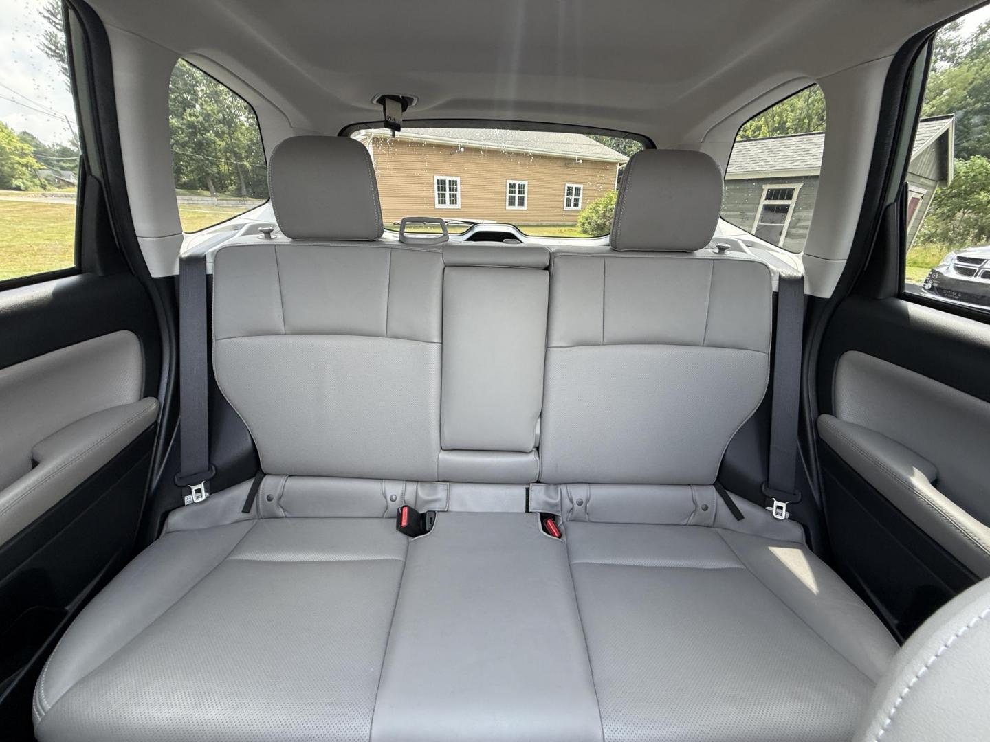 2016 Green /Gray Subaru Forester 2.5i Limited (JF2SJAHC9GH) with an 2.5L H4 DOHC 16V engine, Automatic transmission, located at 11115 Chardon Rd. , Chardon, OH, 44024, (440) 214-9705, 41.580246, -81.241943 - Photo#30