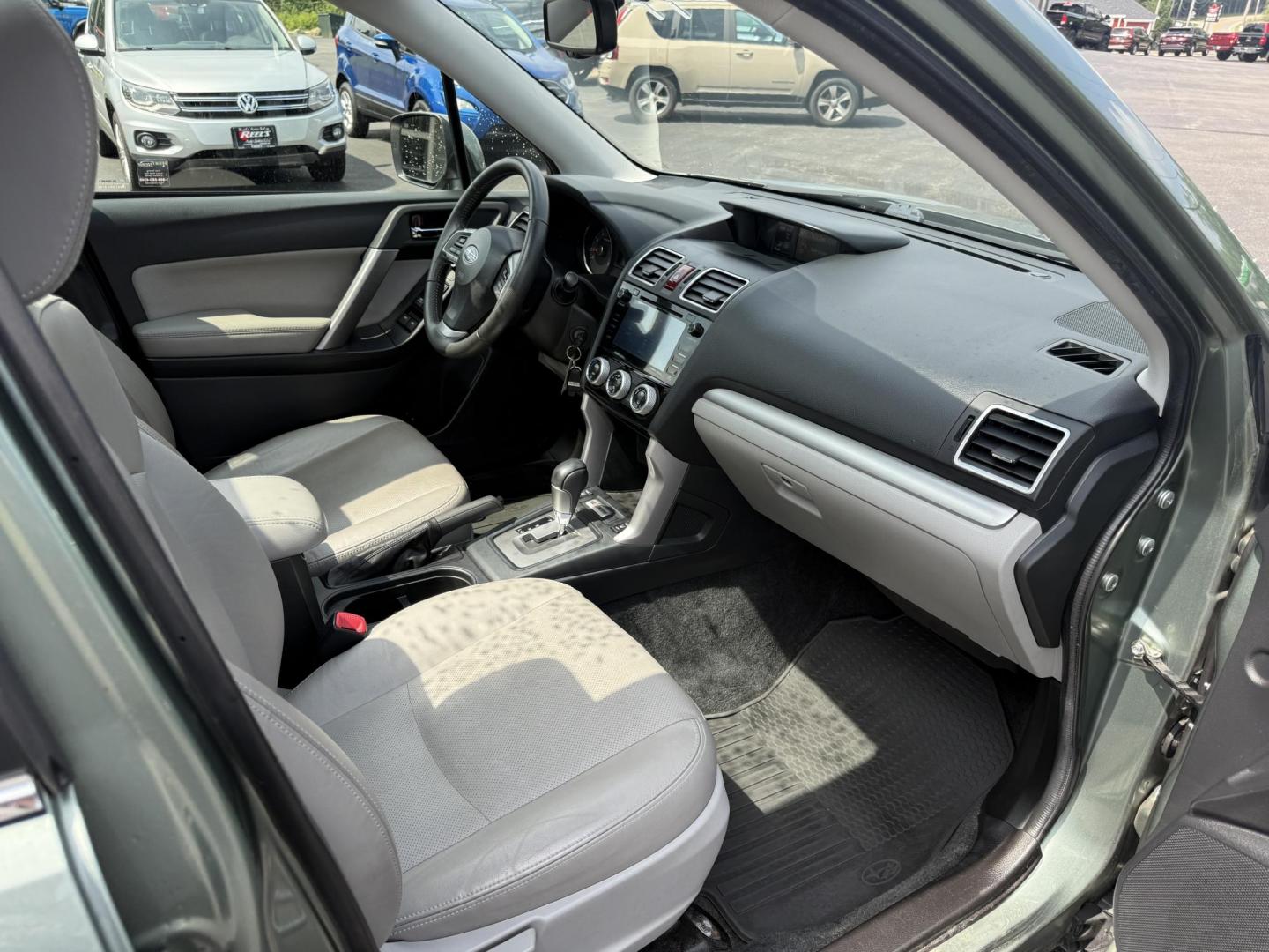 2016 Green /Gray Subaru Forester 2.5i Limited (JF2SJAHC9GH) with an 2.5L H4 DOHC 16V engine, Automatic transmission, located at 11115 Chardon Rd. , Chardon, OH, 44024, (440) 214-9705, 41.580246, -81.241943 - Photo#39