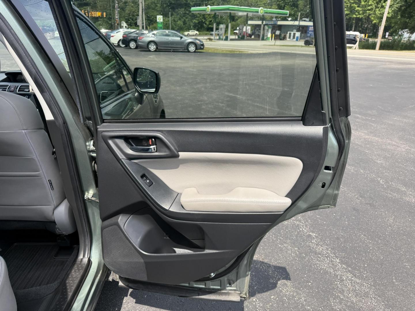 2016 Green /Gray Subaru Forester 2.5i Limited (JF2SJAHC9GH) with an 2.5L H4 DOHC 16V engine, Automatic transmission, located at 11115 Chardon Rd. , Chardon, OH, 44024, (440) 214-9705, 41.580246, -81.241943 - Photo#38