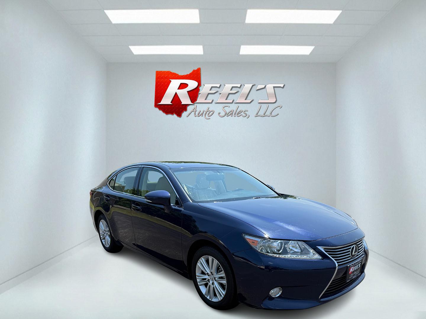 2015 Blue /Tan Lexus ES 350 Sedan (JTHBK1GG3F2) with an 3.5L V6 DOHC 24V engine, 6-Speed Automatic transmission, located at 11115 Chardon Rd. , Chardon, OH, 44024, (440) 214-9705, 41.580246, -81.241943 - This 2015 Lexus ES 350 is a luxurious midsize sedan powered by a smooth 3.5L V6 engine mated to a 6-speed automatic transmission, offering up to 31 MPG on the highway. Its upscale interior features leather upholstery, heated and cooled front seats, three driver memory settings, an 8.0" center screen - Photo#2