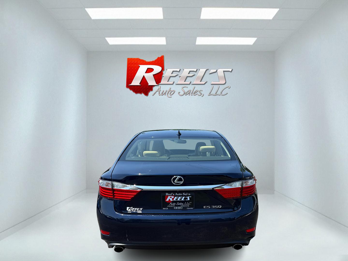 2015 Blue /Tan Lexus ES 350 Sedan (JTHBK1GG3F2) with an 3.5L V6 DOHC 24V engine, 6-Speed Automatic transmission, located at 11115 Chardon Rd. , Chardon, OH, 44024, (440) 214-9705, 41.580246, -81.241943 - This 2015 Lexus ES 350 is a luxurious midsize sedan powered by a smooth 3.5L V6 engine mated to a 6-speed automatic transmission, offering up to 31 MPG on the highway. Its upscale interior features leather upholstery, heated and cooled front seats, three driver memory settings, an 8.0" center screen - Photo#8