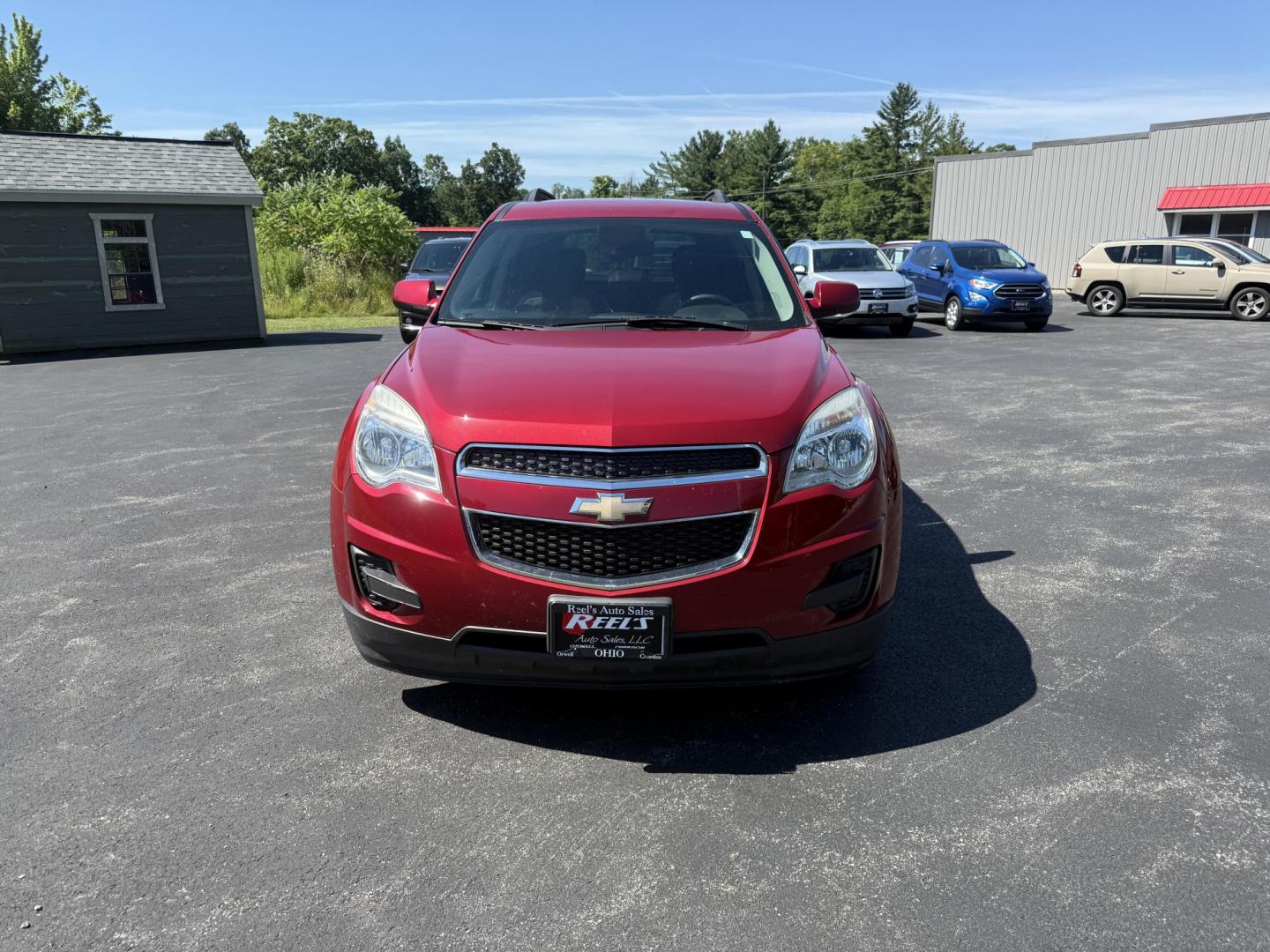 2015 Red /White Chevrolet Equinox 1LT 2WD (2GNALBEK0F6) with an 2.4L I4 DOHC 16V FFV engine, 6-Speed Automatic transmission, located at 11115 Chardon Rd. , Chardon, OH, 44024, (440) 214-9705, 41.580246, -81.241943 - FRESH TRADE ALERT ---- This 2015 Chevrolet Equinox LT 2WD with a 2.4L I4 EcoTec engine and 6-speed automatic transmission offers a solid blend of practicality and comfort, featuring a power driver's seat, daytime running lights, dusk-sensing headlights, remote start, a 7.0-inch touchscreen, and a ba - Photo#1