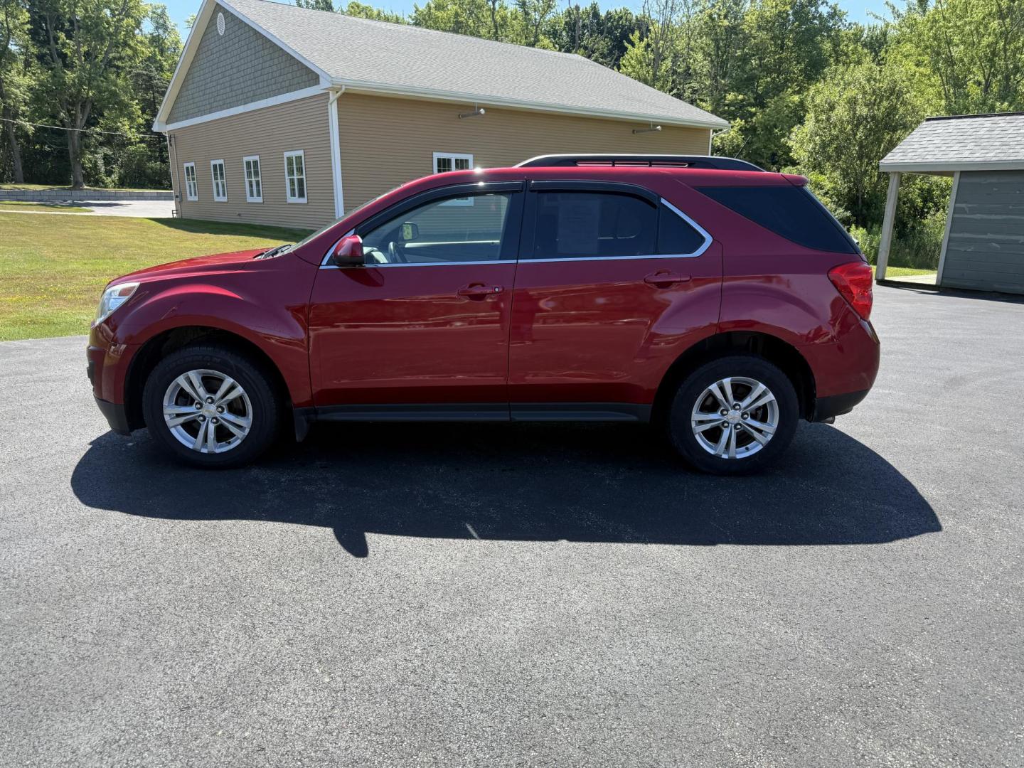 2015 Red /White Chevrolet Equinox 1LT 2WD (2GNALBEK0F6) with an 2.4L I4 DOHC 16V FFV engine, 6-Speed Automatic transmission, located at 11115 Chardon Rd. , Chardon, OH, 44024, (440) 214-9705, 41.580246, -81.241943 - FRESH TRADE ALERT ---- This 2015 Chevrolet Equinox LT 2WD with a 2.4L I4 EcoTec engine and 6-speed automatic transmission offers a solid blend of practicality and comfort, featuring a power driver's seat, daytime running lights, dusk-sensing headlights, remote start, a 7.0-inch touchscreen, and a ba - Photo#12