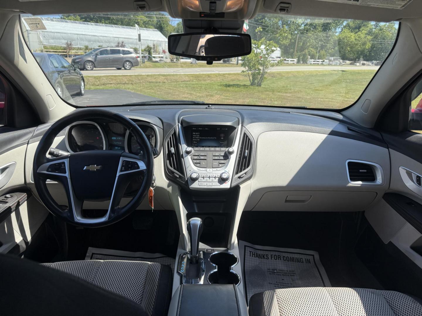 2015 Red /White Chevrolet Equinox 1LT 2WD (2GNALBEK0F6) with an 2.4L I4 DOHC 16V FFV engine, 6-Speed Automatic transmission, located at 11115 Chardon Rd. , Chardon, OH, 44024, (440) 214-9705, 41.580246, -81.241943 - FRESH TRADE ALERT ---- This 2015 Chevrolet Equinox LT 2WD with a 2.4L I4 EcoTec engine and 6-speed automatic transmission offers a solid blend of practicality and comfort, featuring a power driver's seat, daytime running lights, dusk-sensing headlights, remote start, a 7.0-inch touchscreen, and a ba - Photo#31